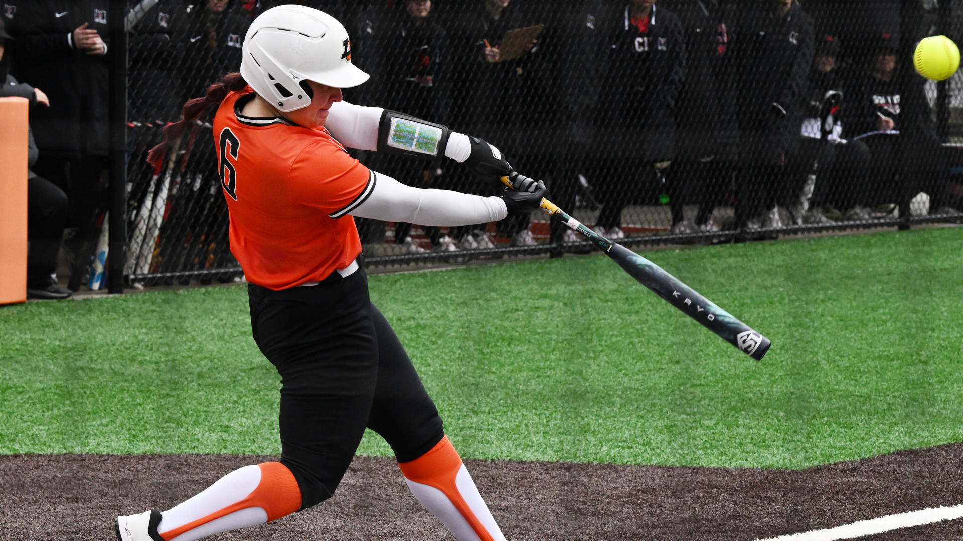 Harper Campanella swings and crushes the softball 
