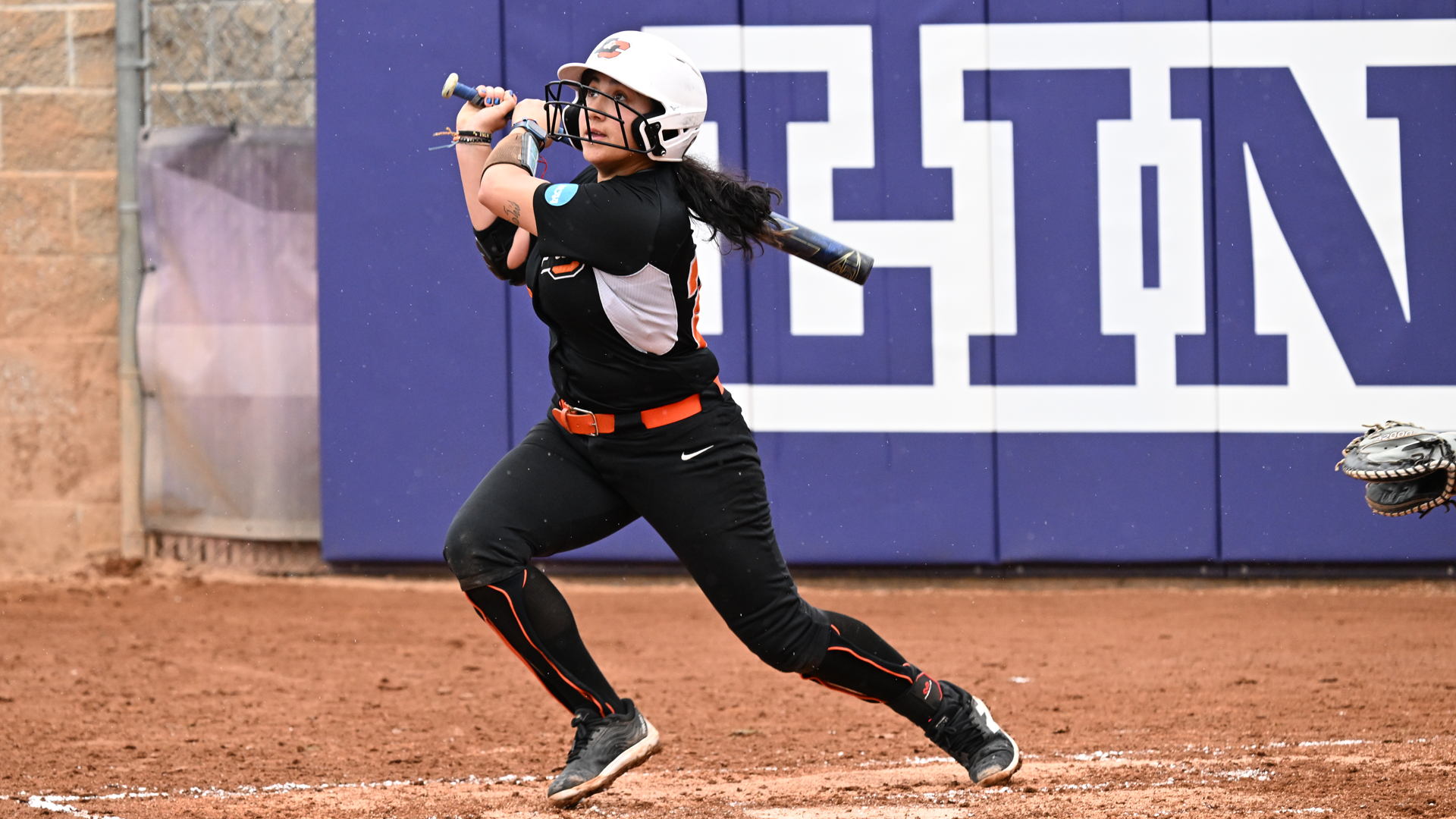 Gina Ozuna swings and watches the ball fly against Chapman in the 2025 NCAA Tournament