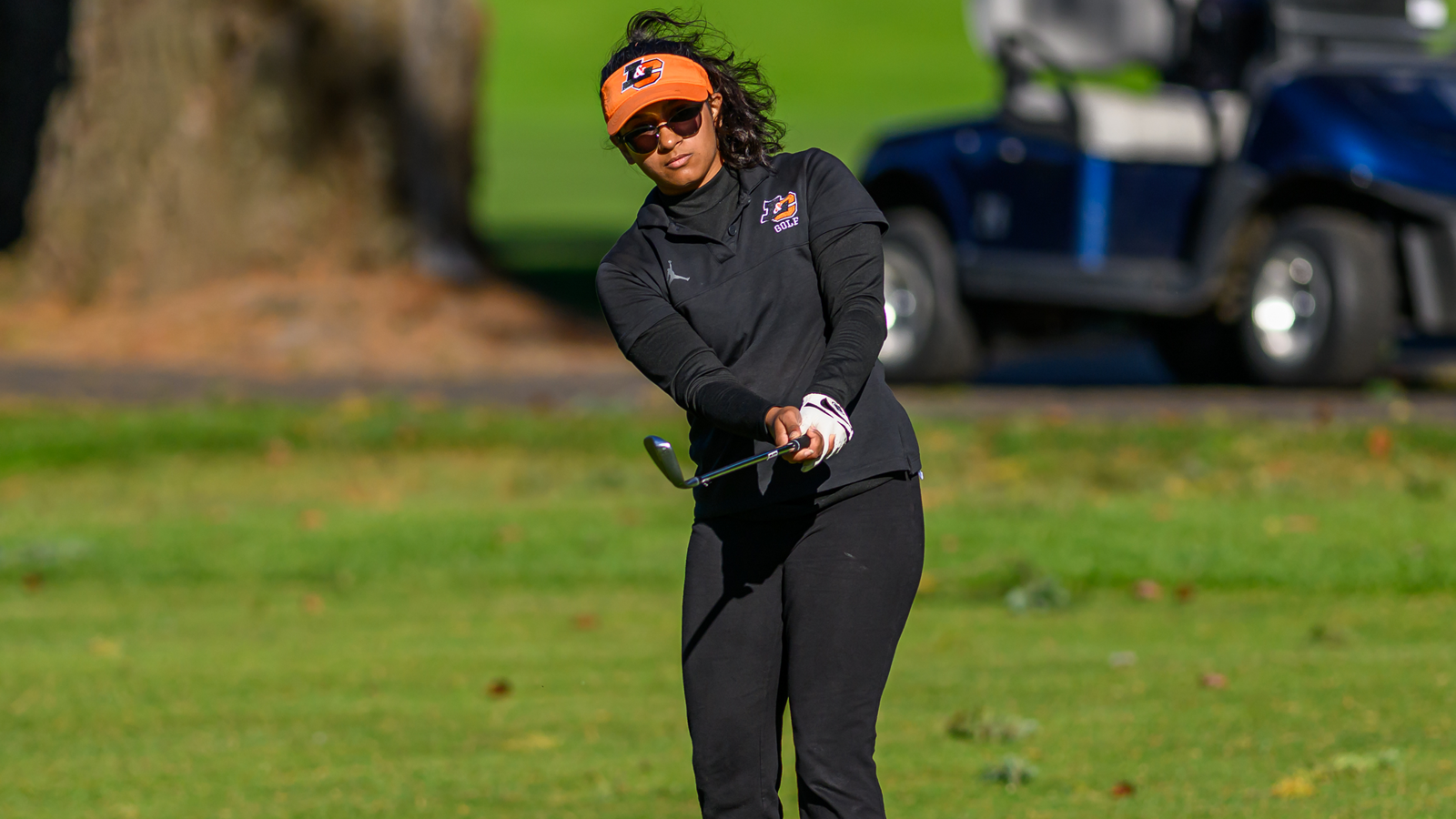 Ahika Jani watches her iron shot fly towards the hole
