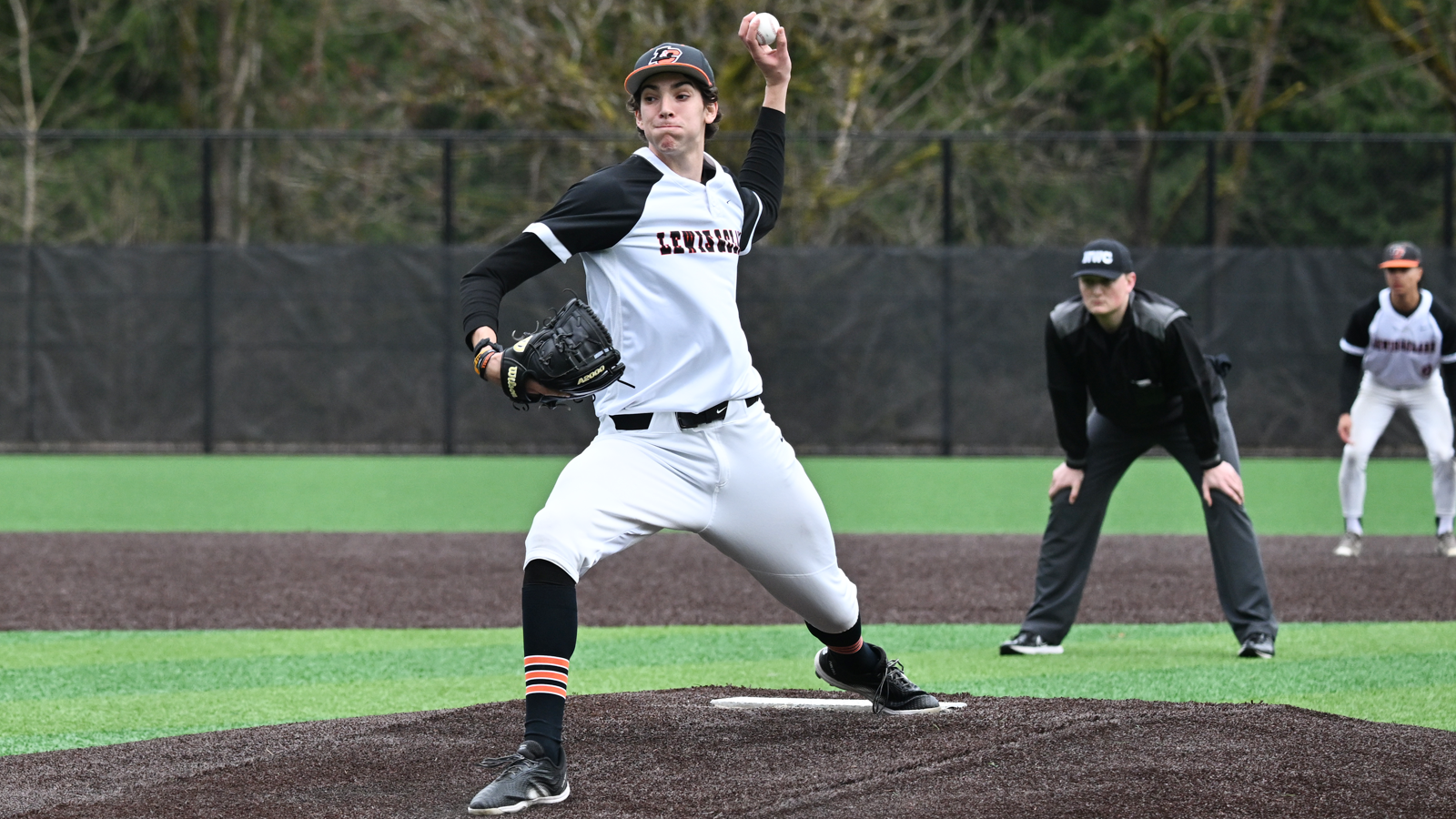 Sam Burchi throws a pitch against Pacific Lutheran 