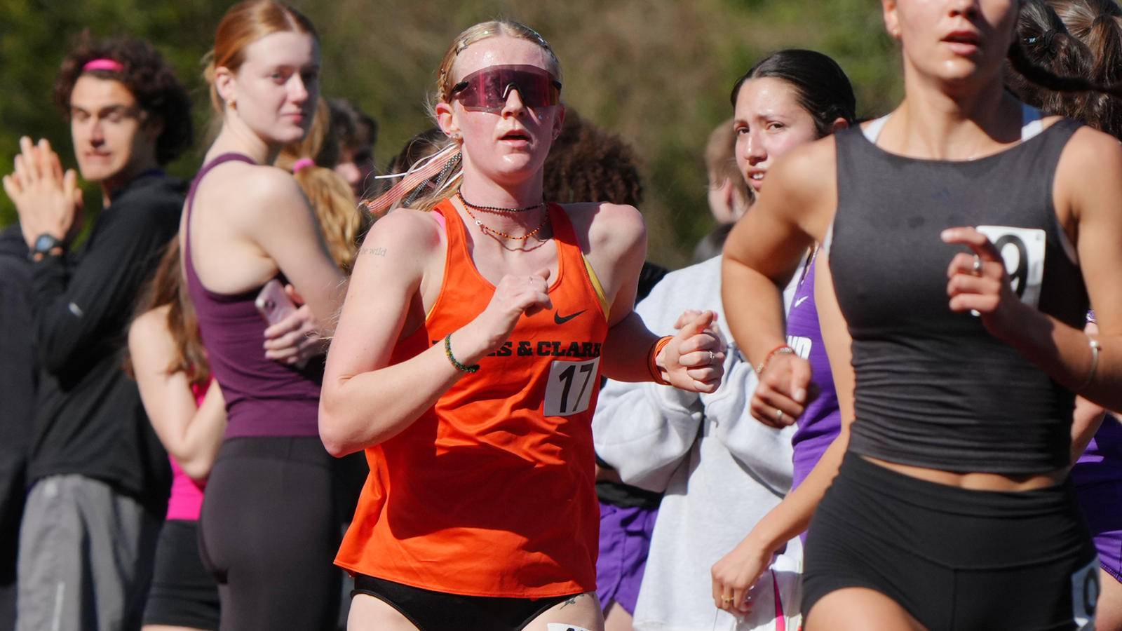 Ali Kerschner runs down the straightway at the L&C Electric Forest Open