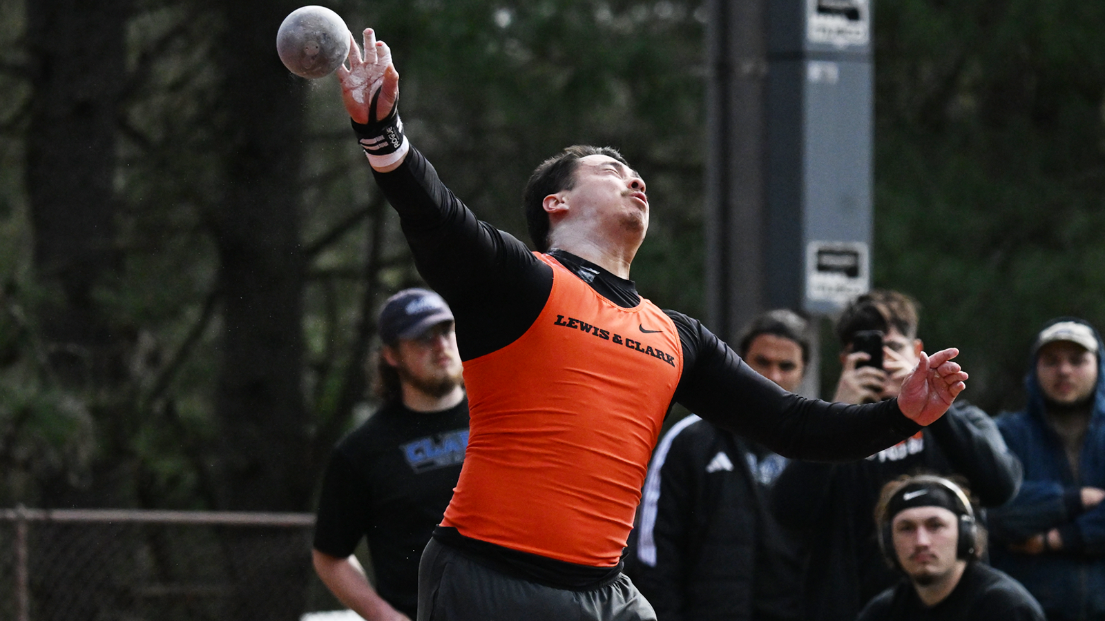 Andrew Baum throws the shot put 