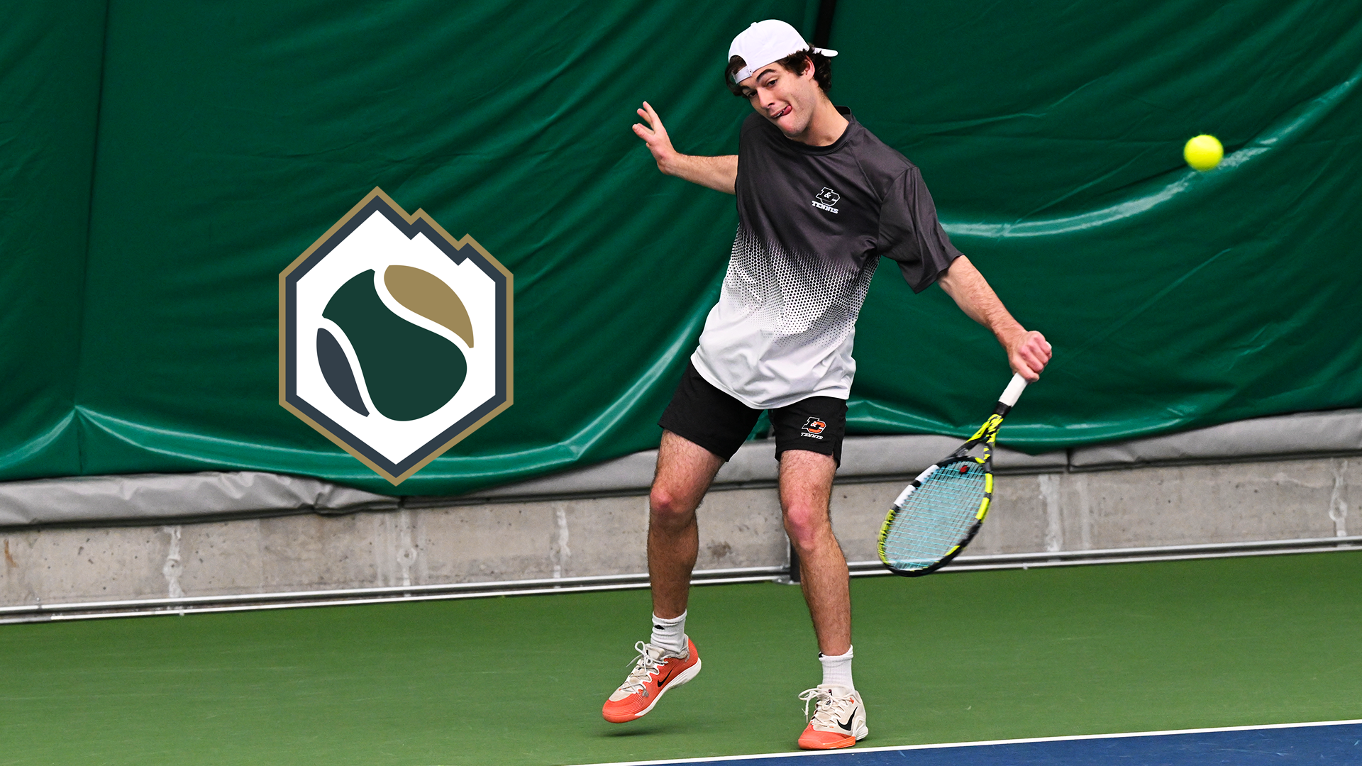 Noah Sutin hits a baseline backhand against George Fox