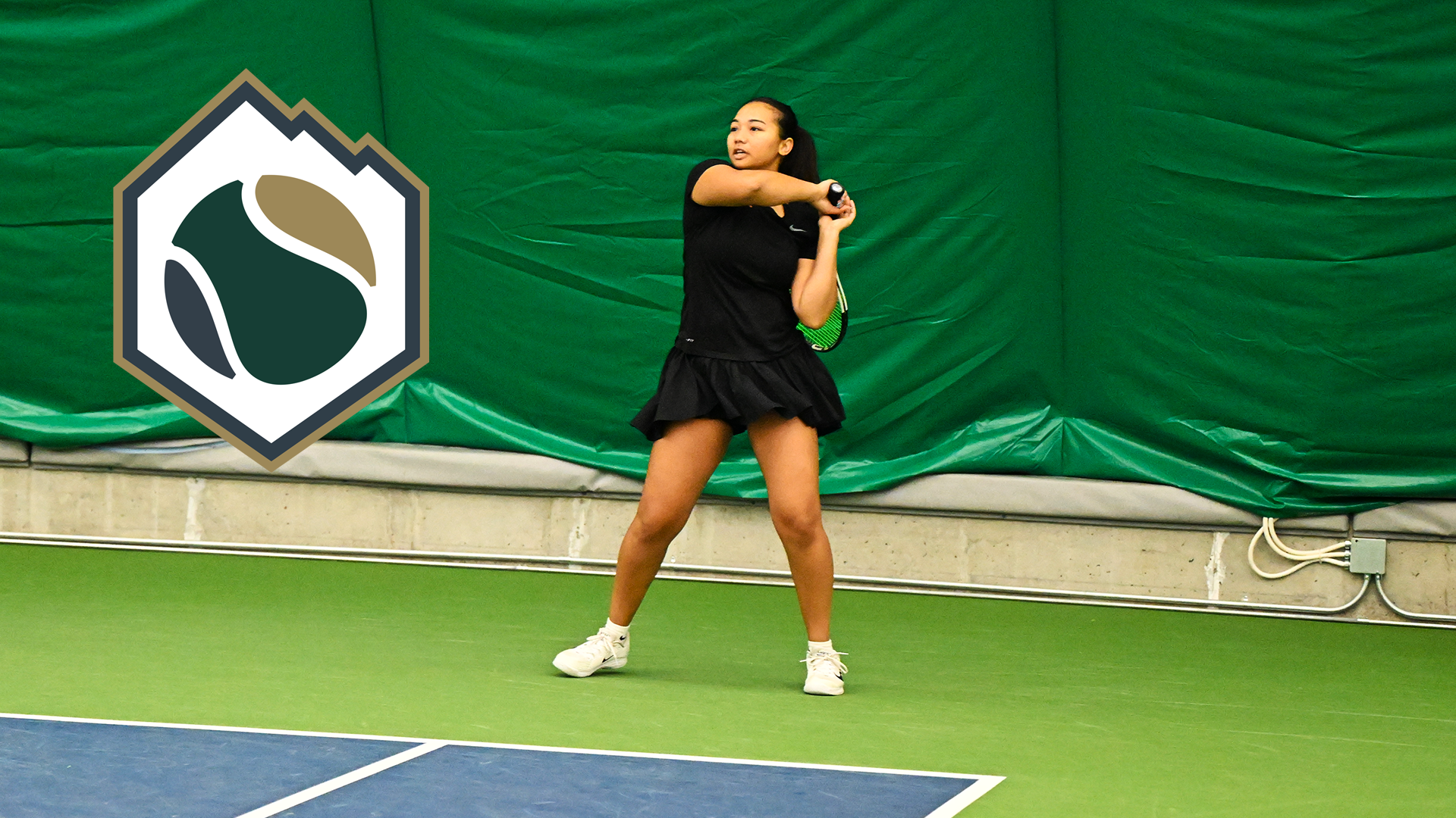 Madi Vianzon follows through on a baseline forehand.