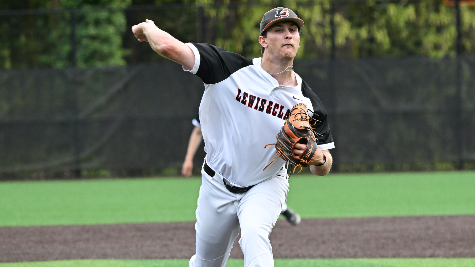 Owen Eisen throws a pitch against George Fox