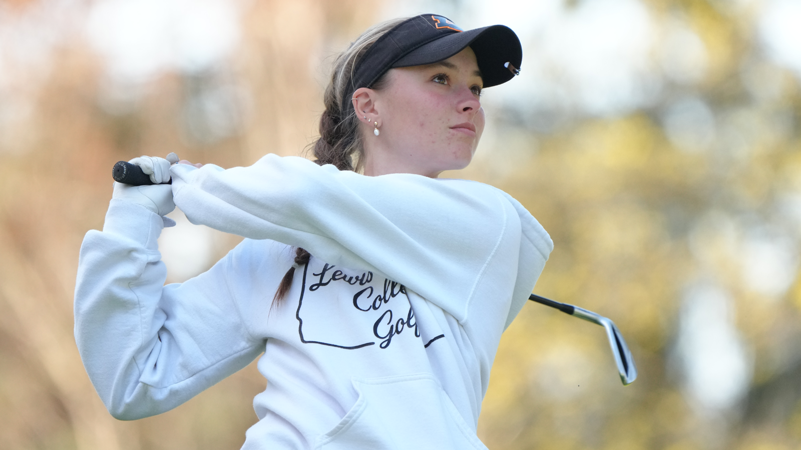 Kimber Yoder watches her shot fly towards the green