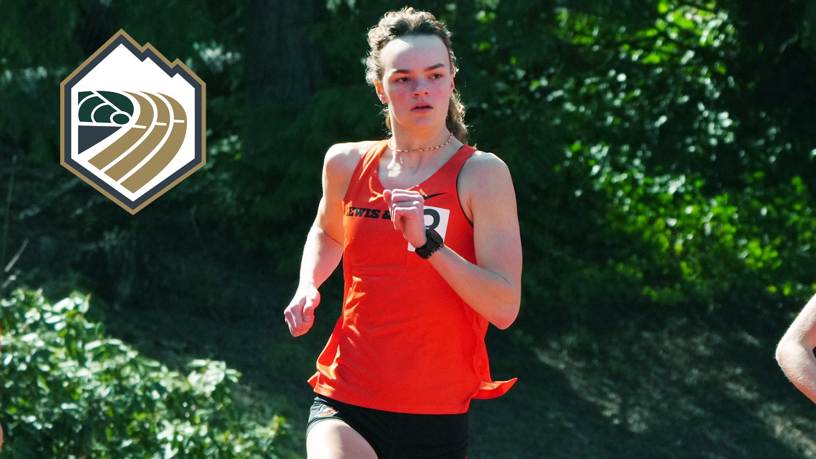 Malia Heien runs the curve of the track in the 800M