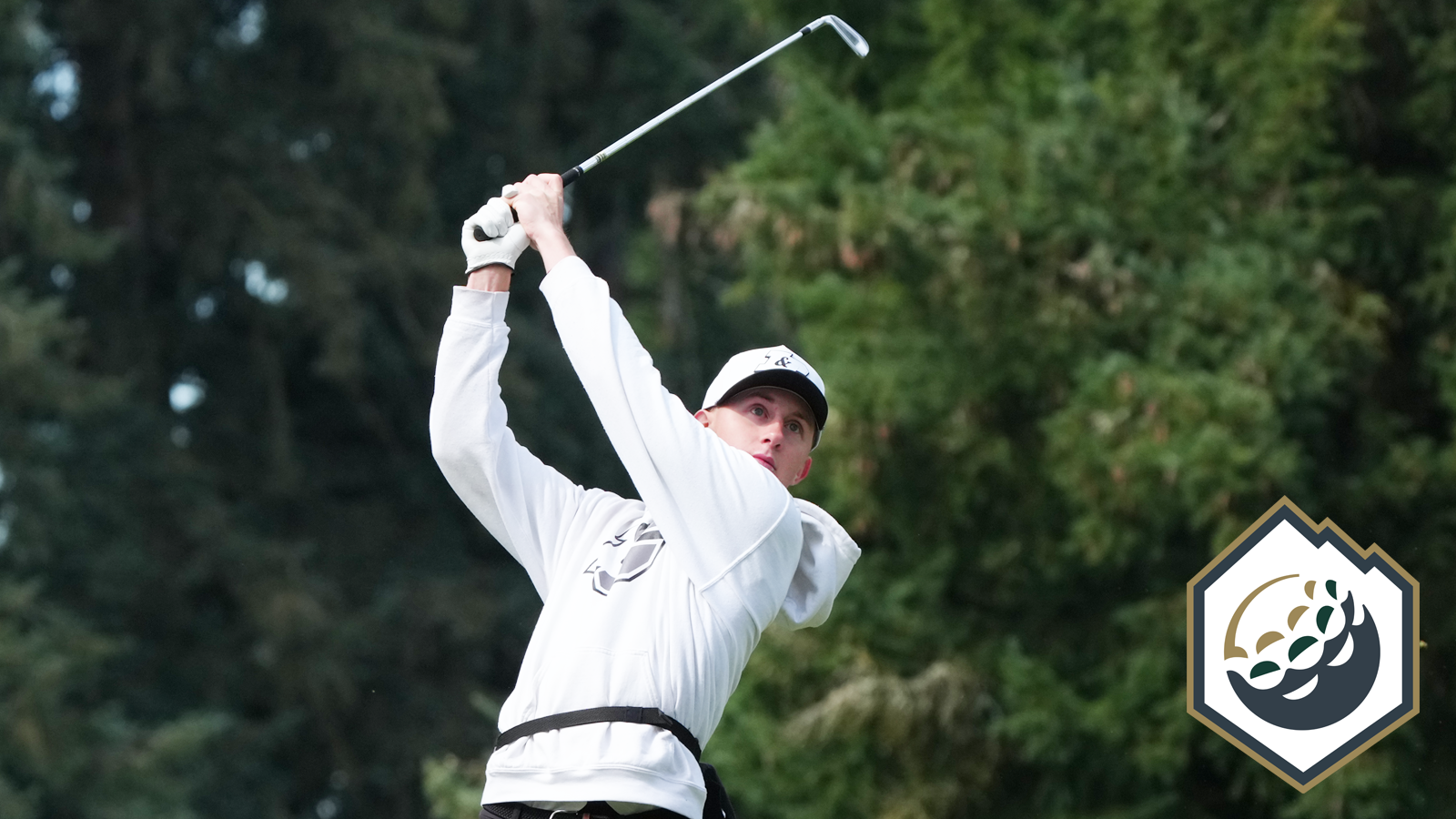 Luke Blankinship hits an iron shot and holds his follow through