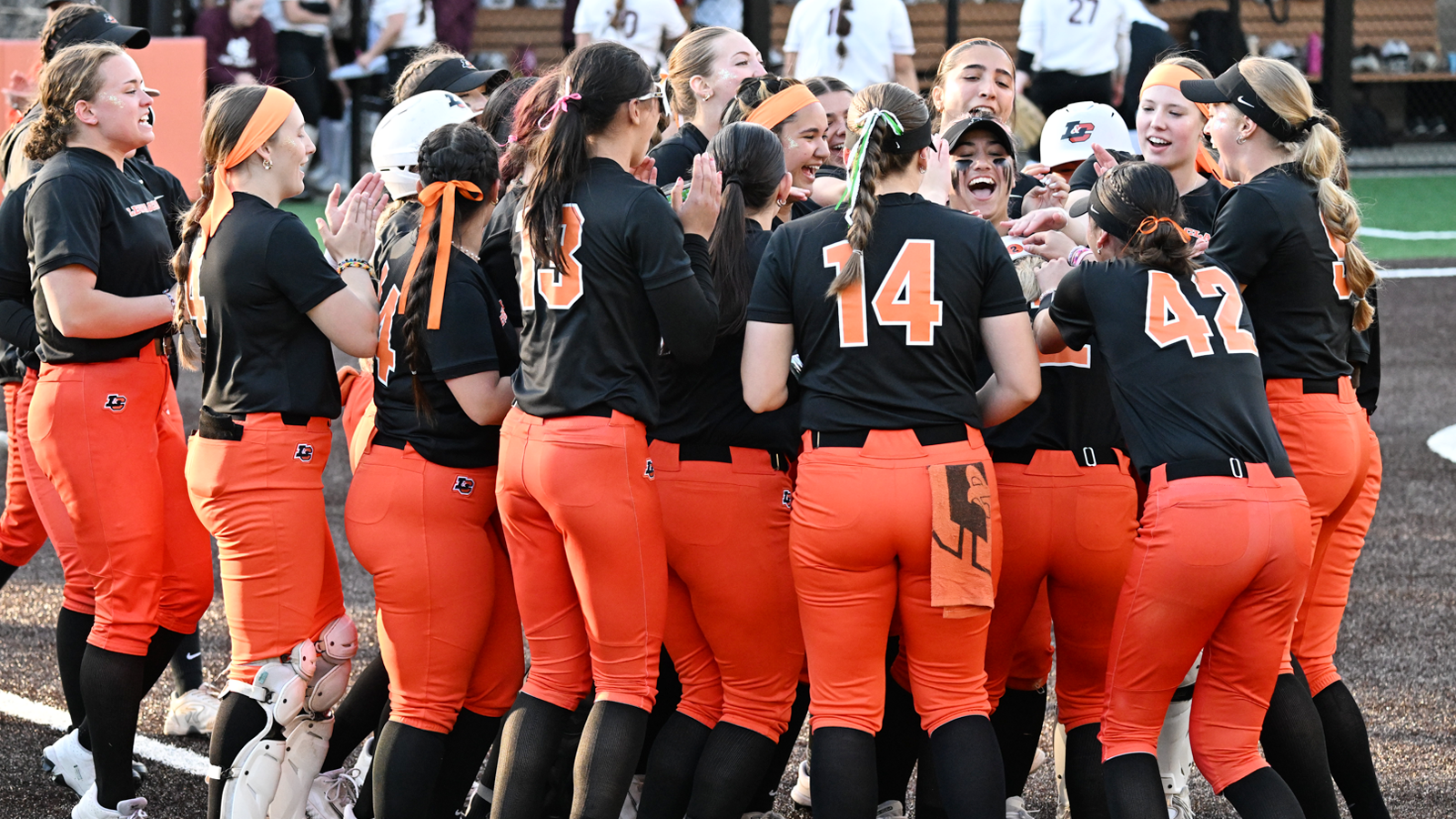 Softball celebrates Emily Patton's walk-off single against Puget Sound