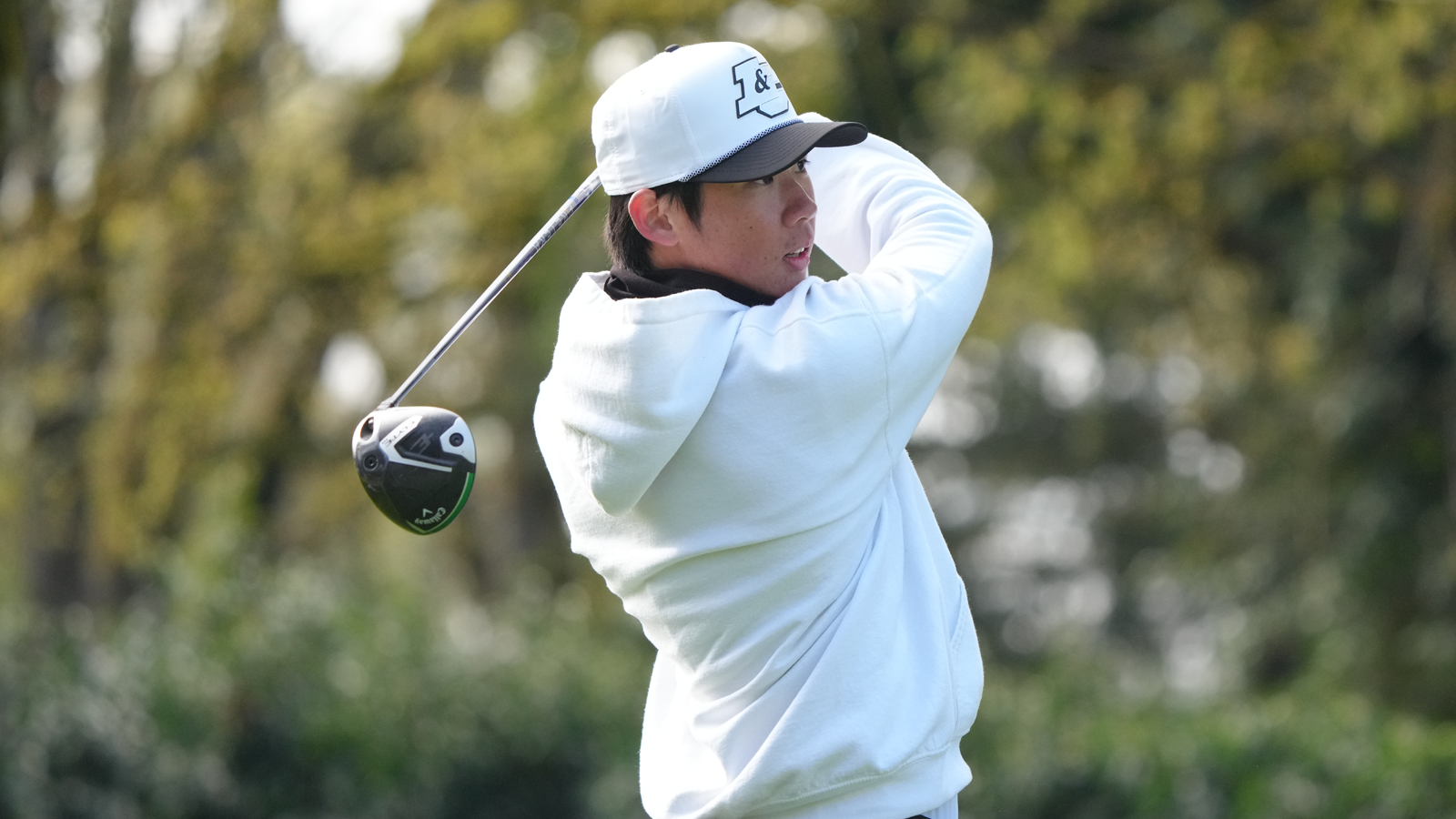 Joonho Moon watches his driver shot fly 
