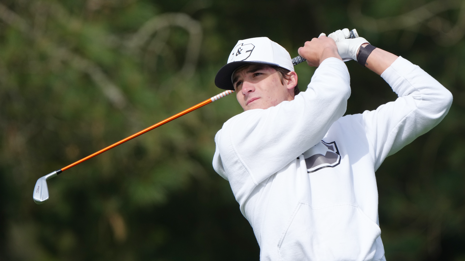 Charlie Hageman watches his iron shot fly towards the green