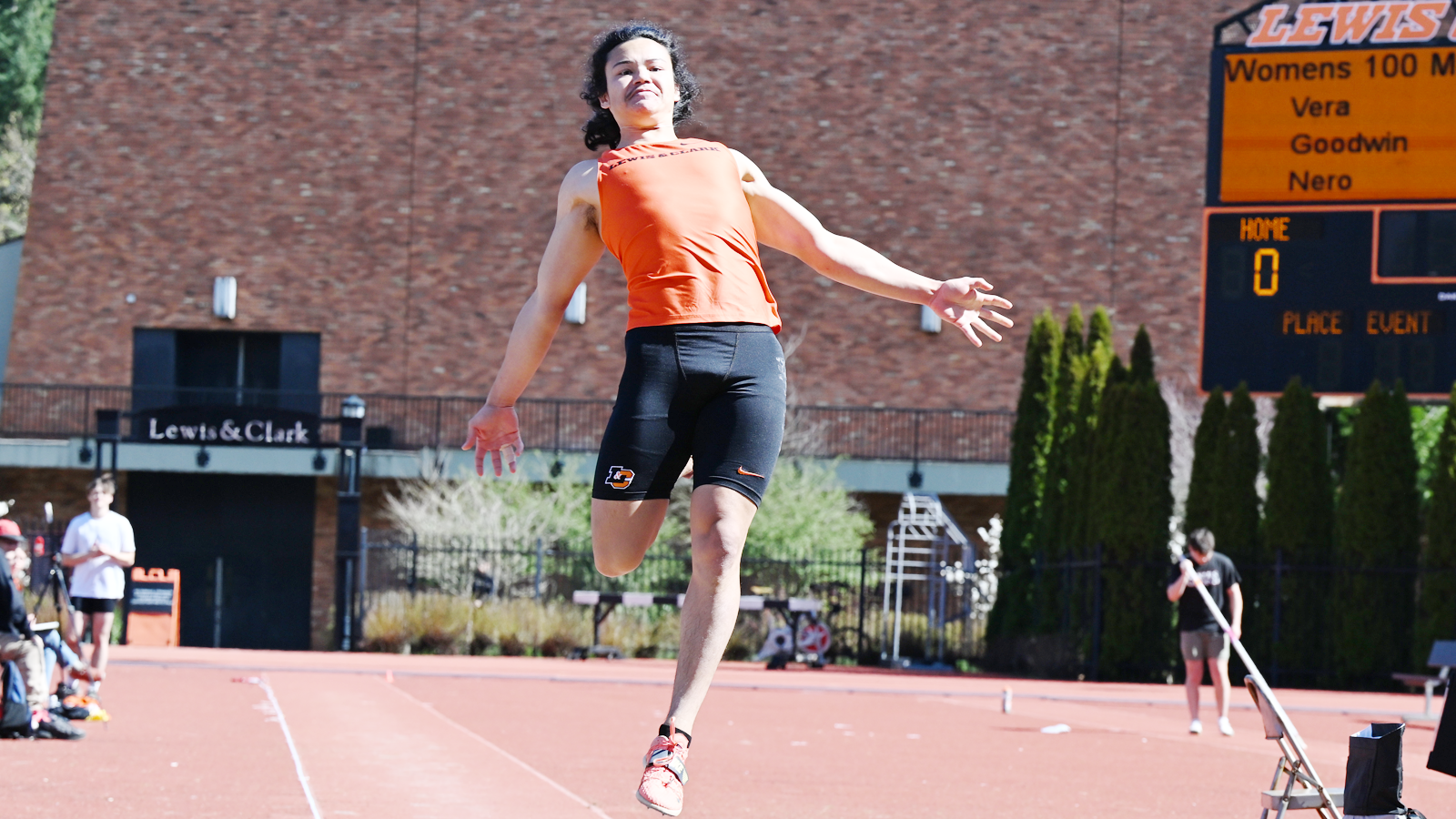 Jon Fritz leaps during the long jump