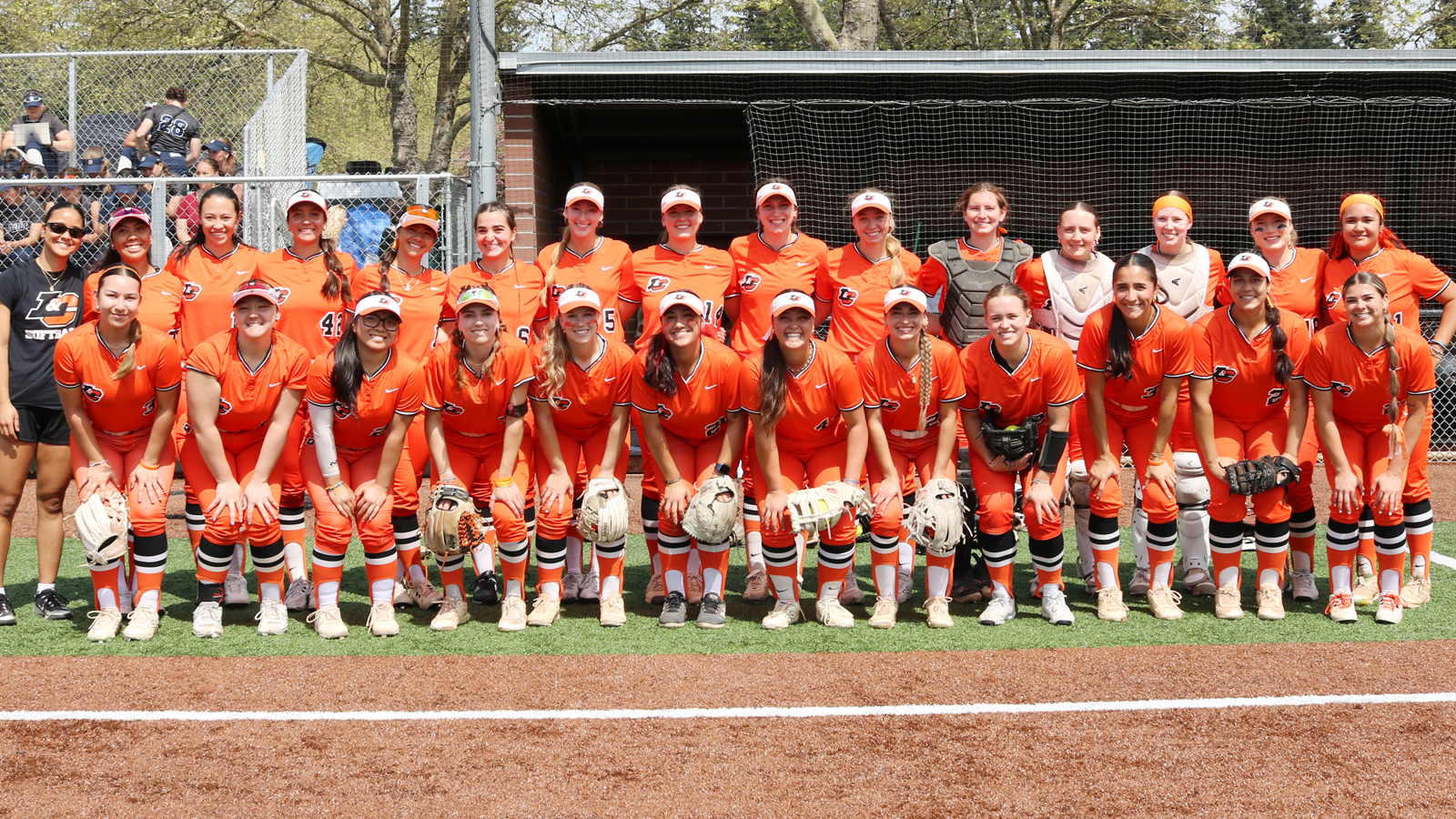 Softball poses for a team photo before the start of the 2026 NWC Tournament
