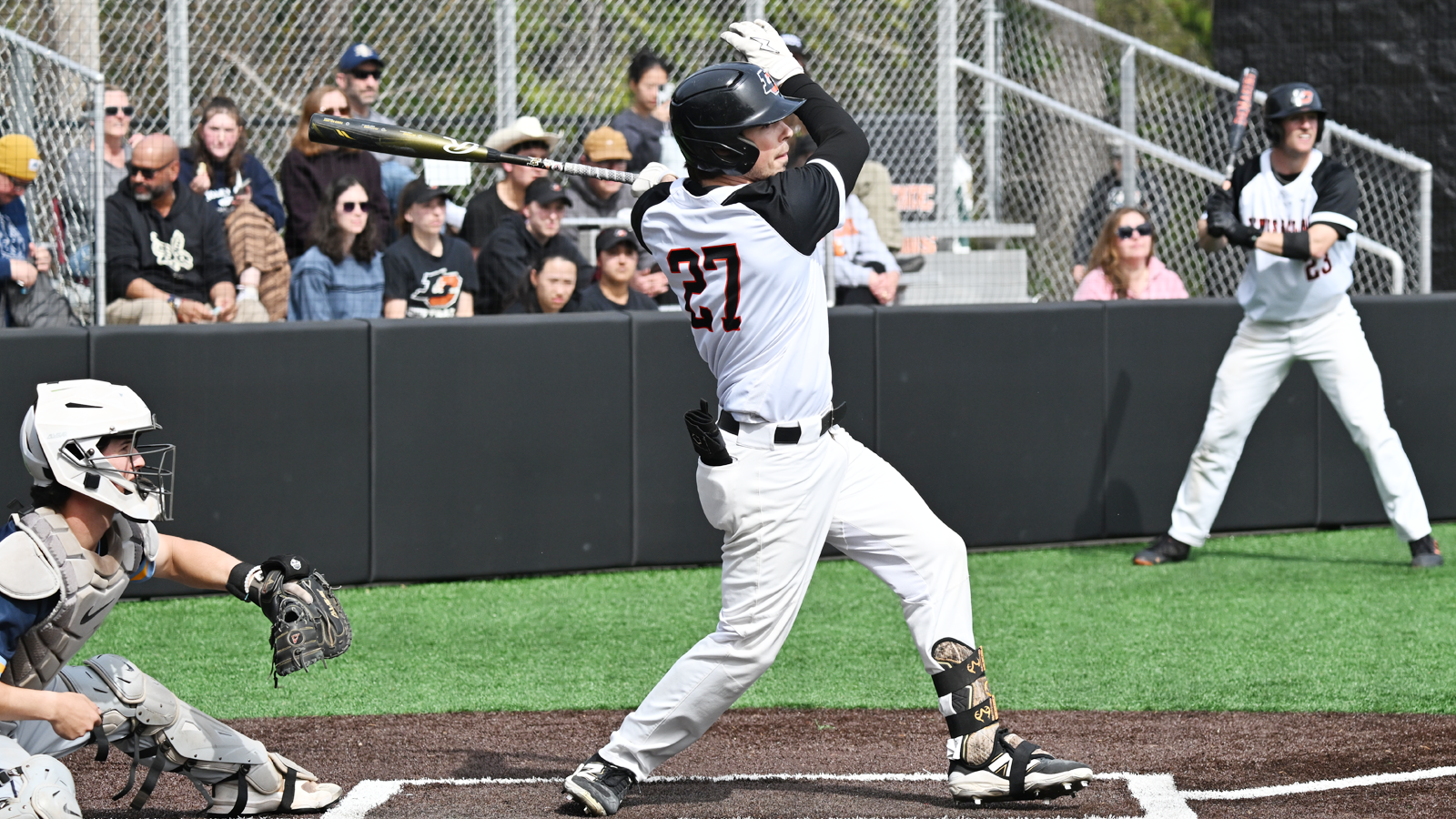 Jacob-Shannon Wilkerson hits a line drive and watches the ball fly to the outfield