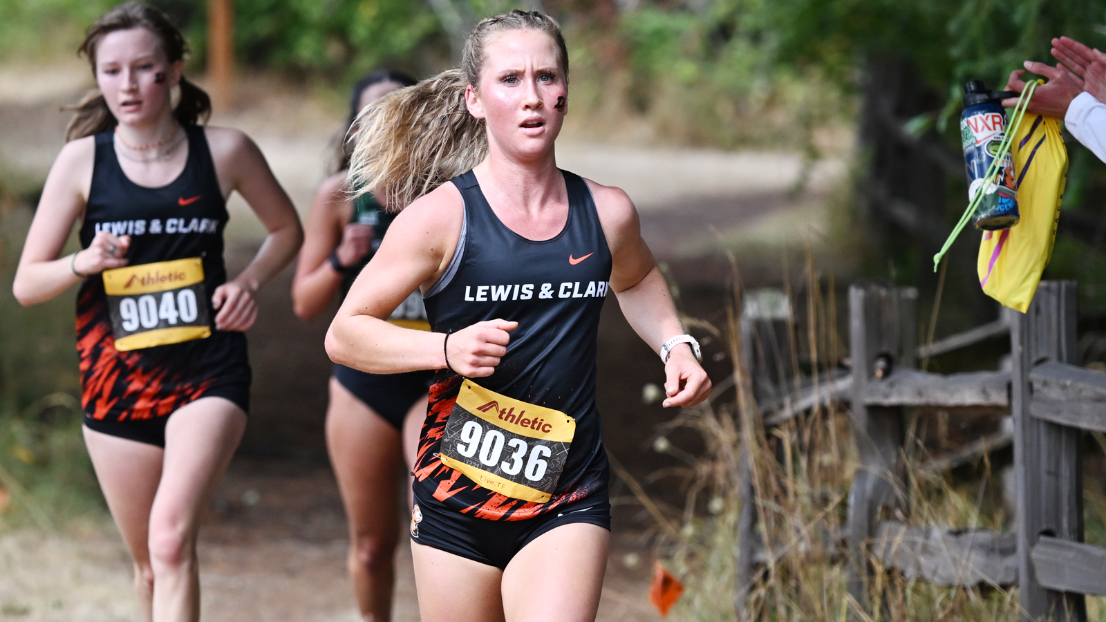 Eva Marley-Jester runs down a trail at the Lewis & Clark XC Opener 2026