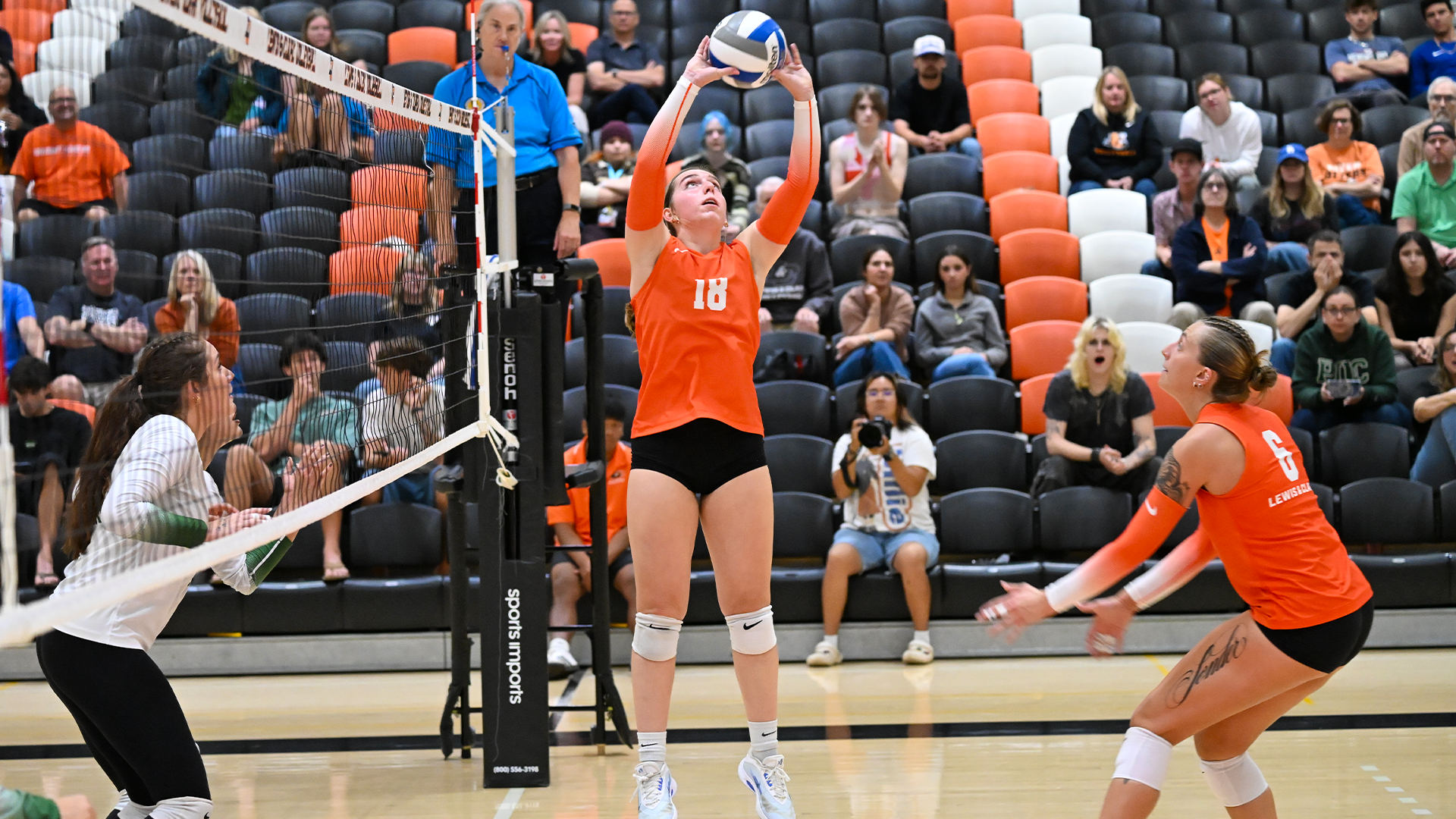 Ruby Kuerschner sets the volleyball in a recent match.