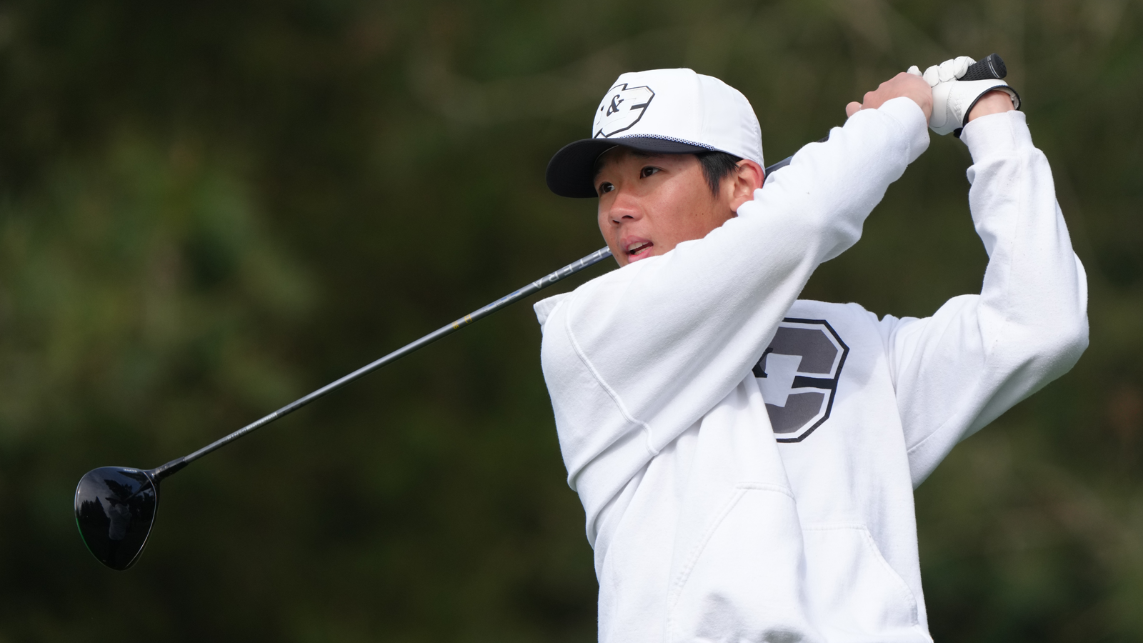 Joonho Moon watches his driver shot fly down the fairway