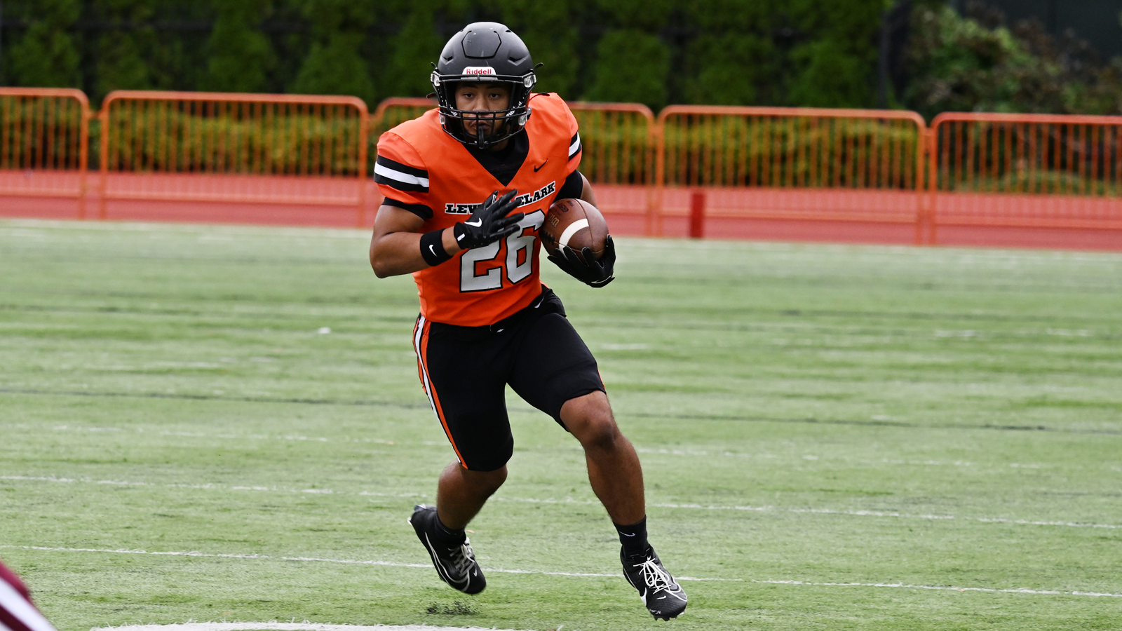 Gio Borea rushes with the ball against Puget Sound