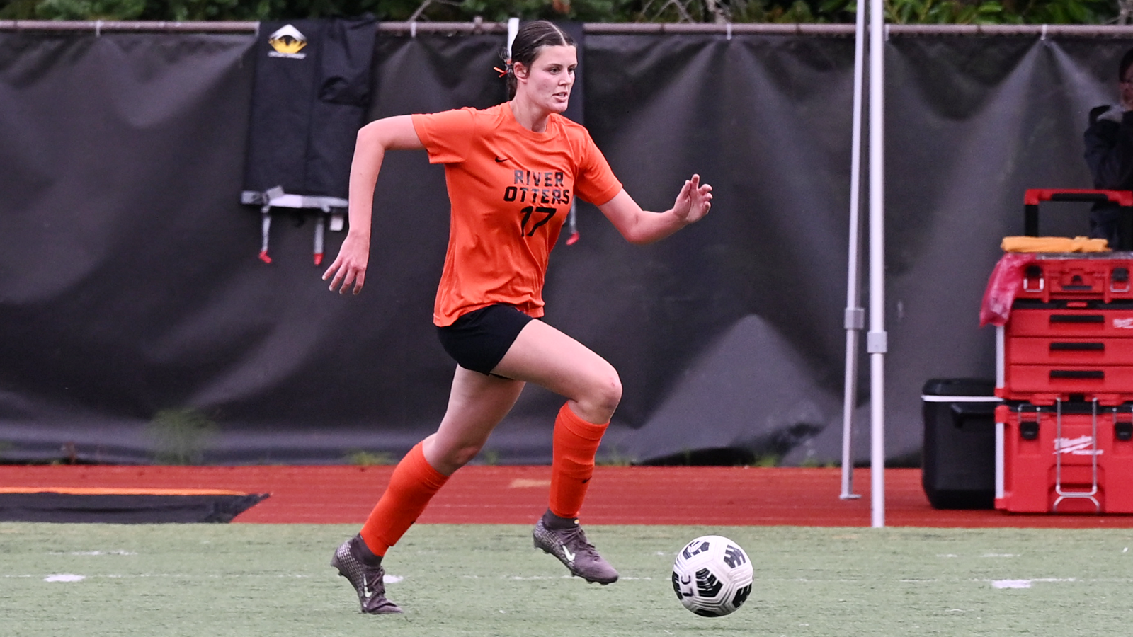 Mischa Vanek dribbles the ball and looks up field 