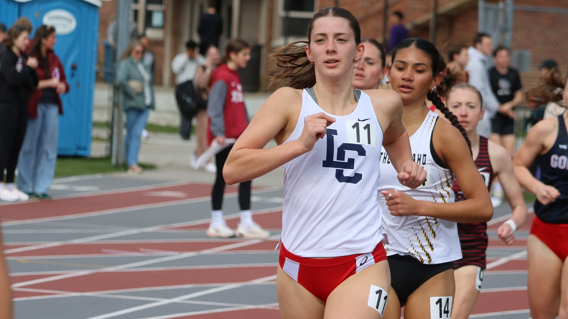 Grace Tiegs runs on the track