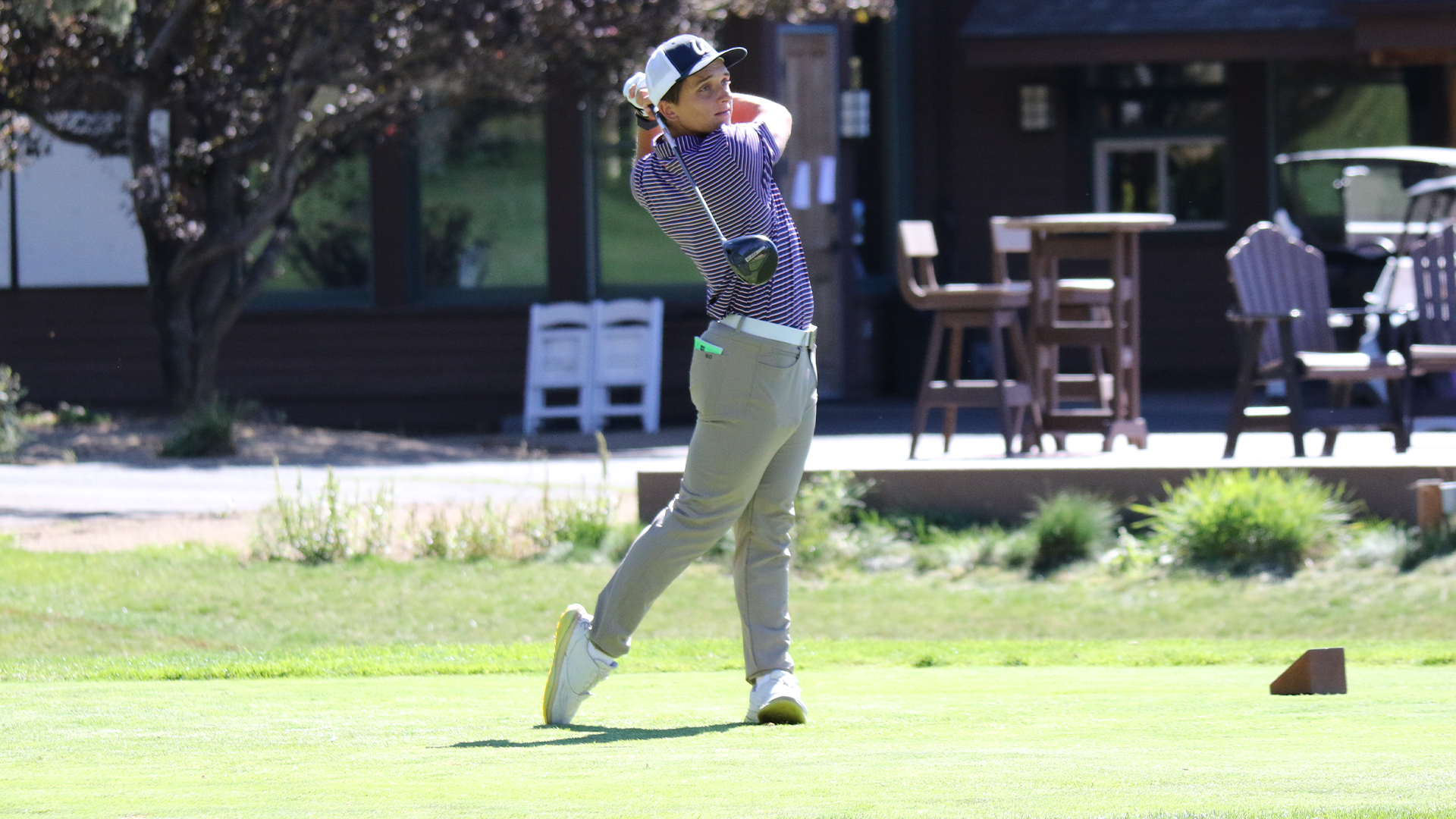 Andrea Artusini swings a golf club