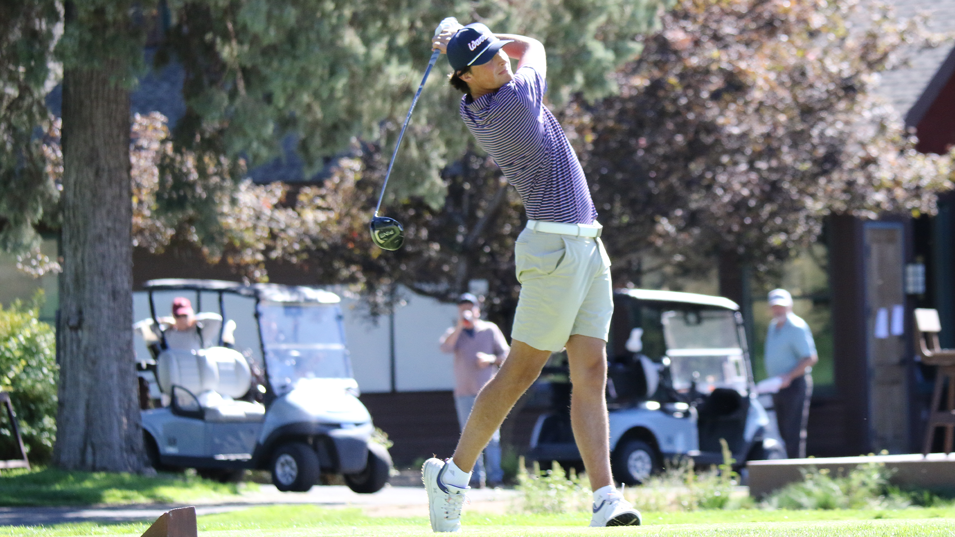Luke West swings a golf club