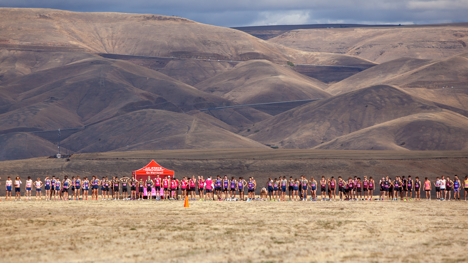 Cross Country runners line up at the starting line