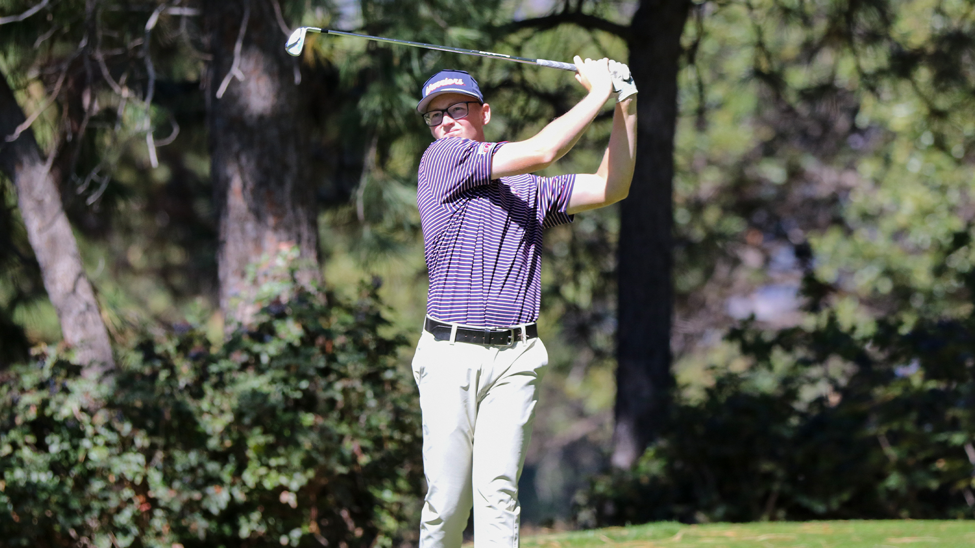 Archie Jones swings a golf club