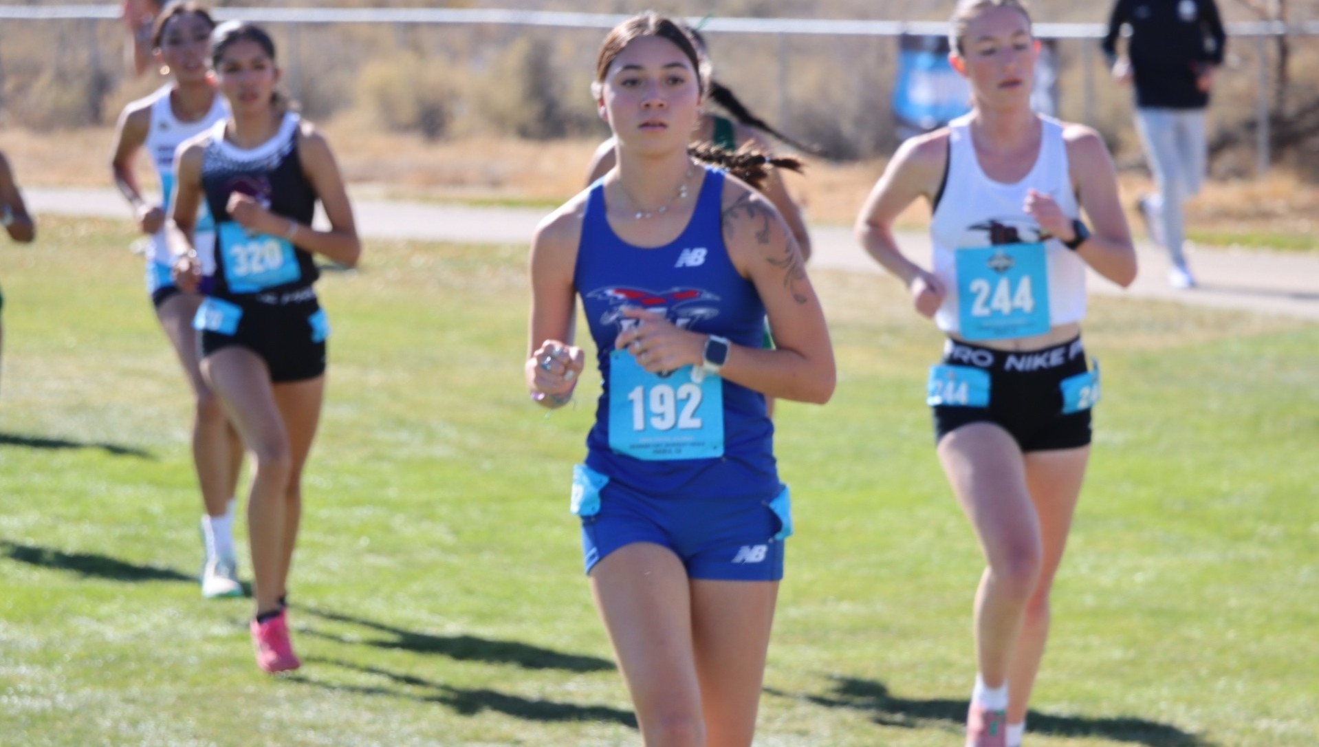 This is a photo of a Lubbock Christian women's cross country runner competing at the NCAA Regional Meet