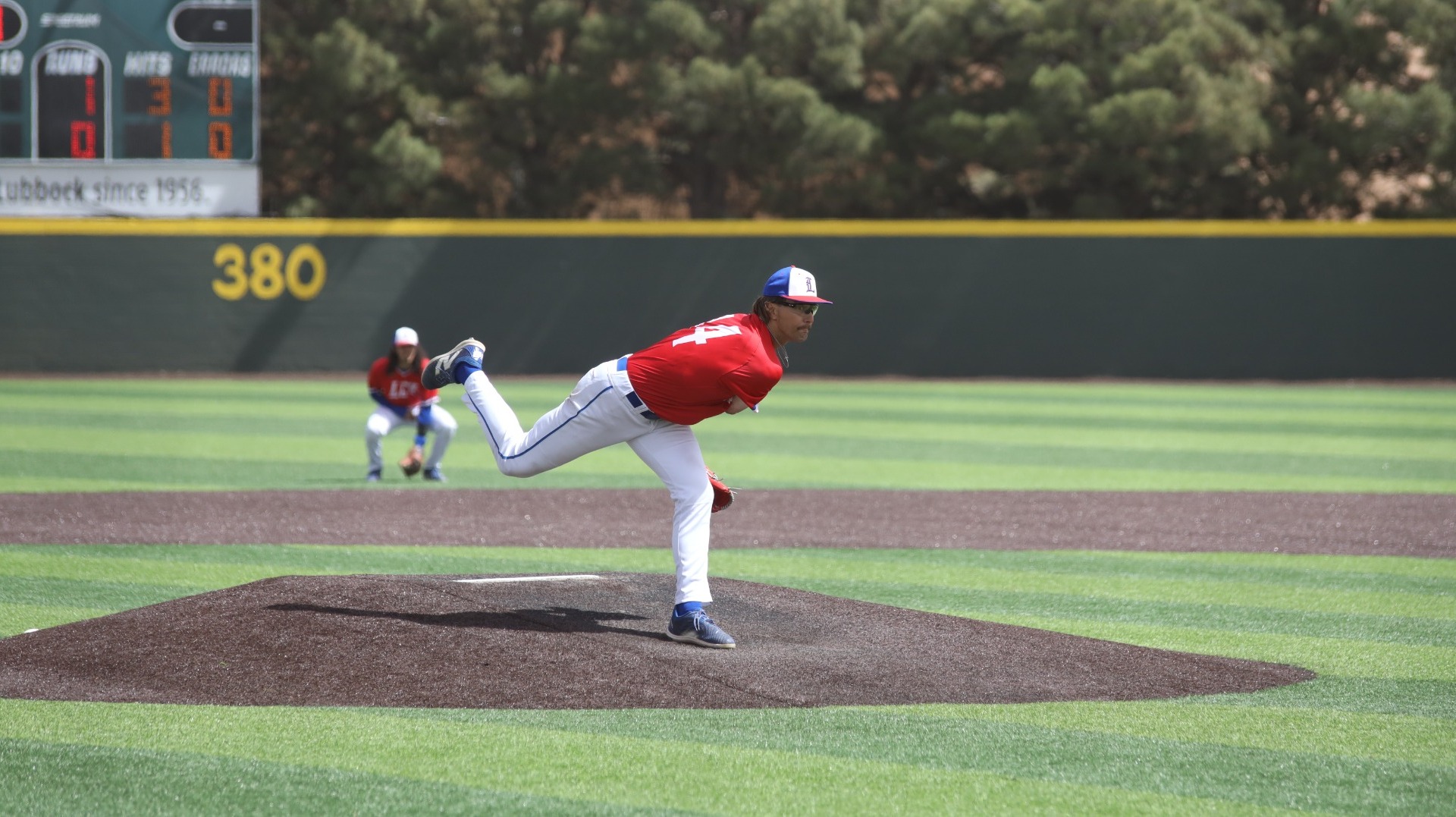 This is a photo of Lubbock Christian pitcher Bryce Nall throwing a pitch during a game at Hays Field. 
