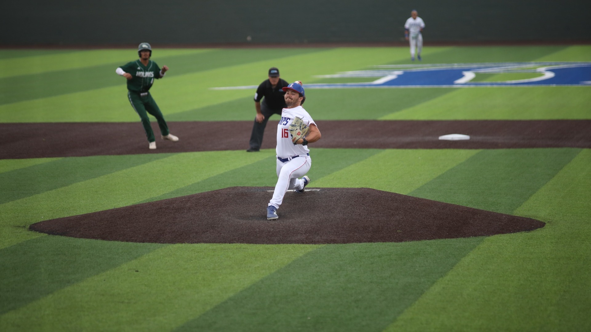 This is a photo of Lubbock Christian pitcher Tyler Sudderth (white jersey, #16) throwing a pitch during a game at Hays Field. 