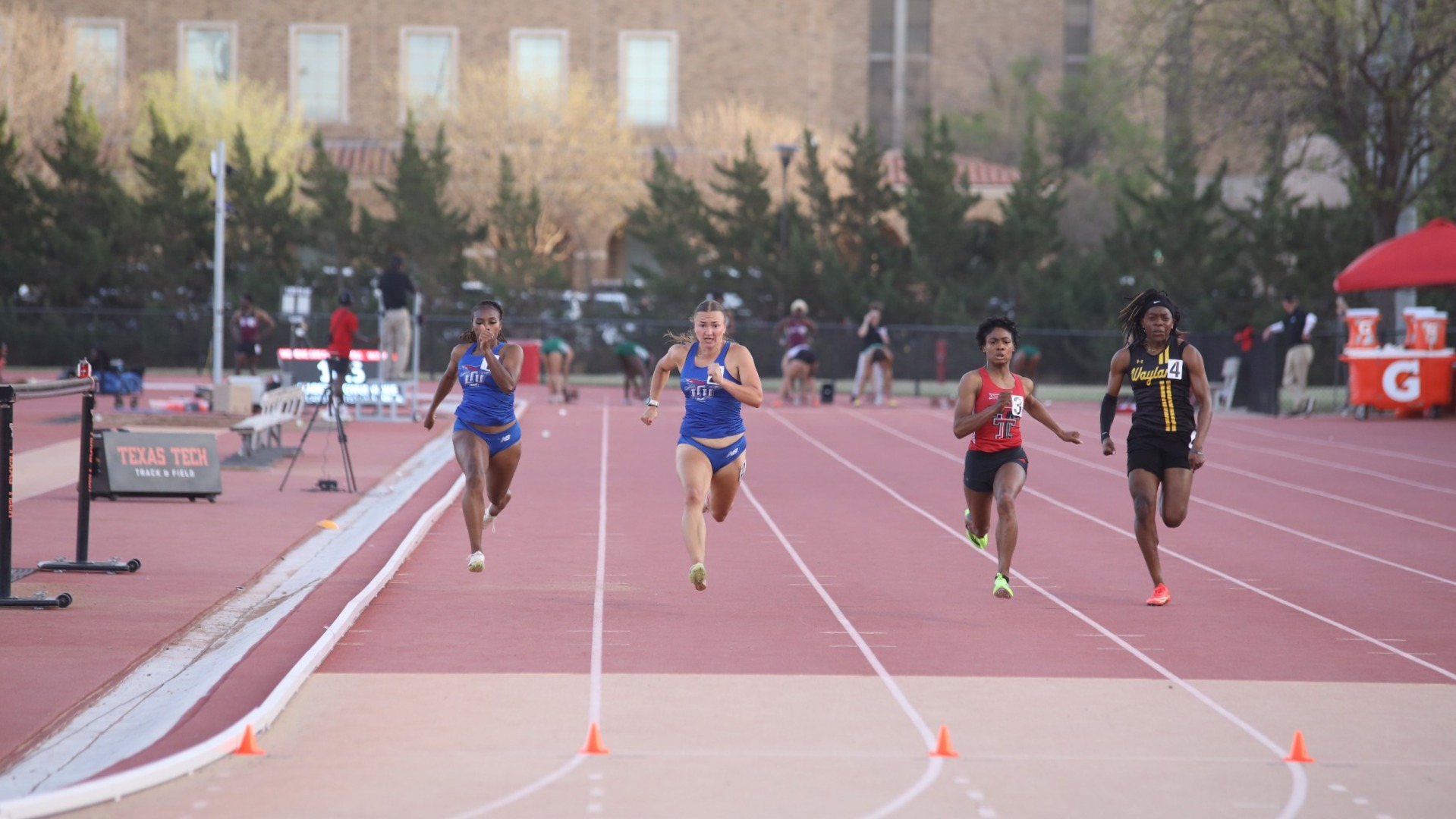 This is a photo of Lubbock Christian track athlete Anika Beukes running a races at the Fuller Track & Field Complex. 