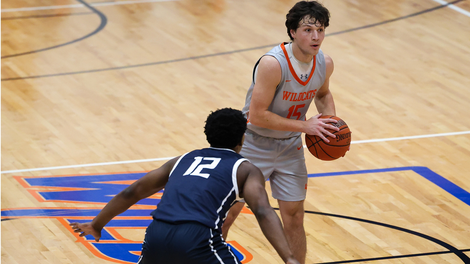 Drew Tebbe holding basketball vs. TAMUT 12/11/25