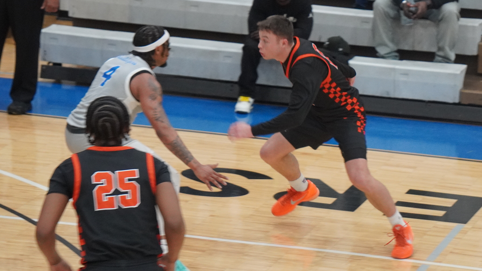 Bryce Weinmunson drives against a UNT-Dallas defender 2/21/26