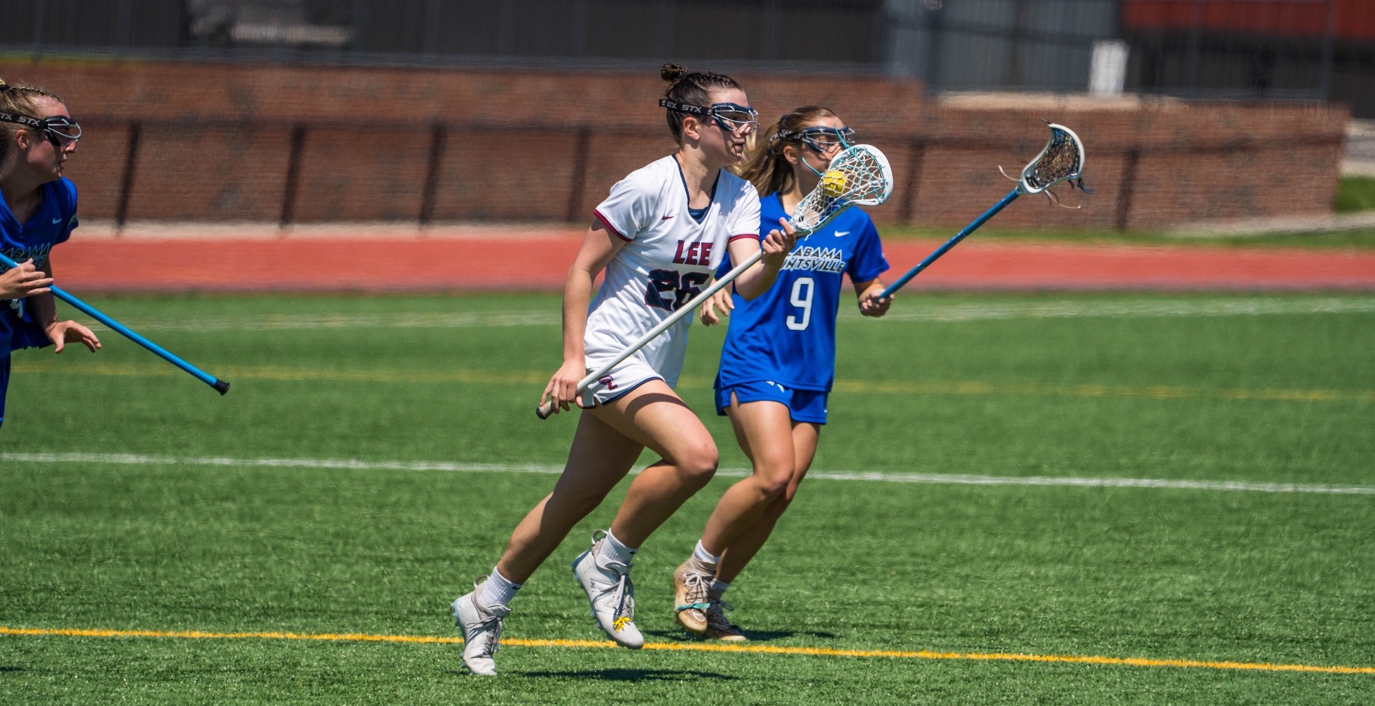 Lewis running with ball