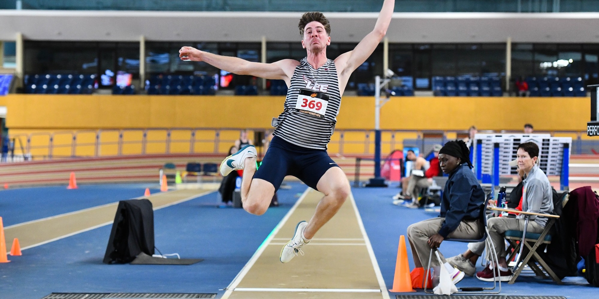 Cameron Stine competes in the long jump