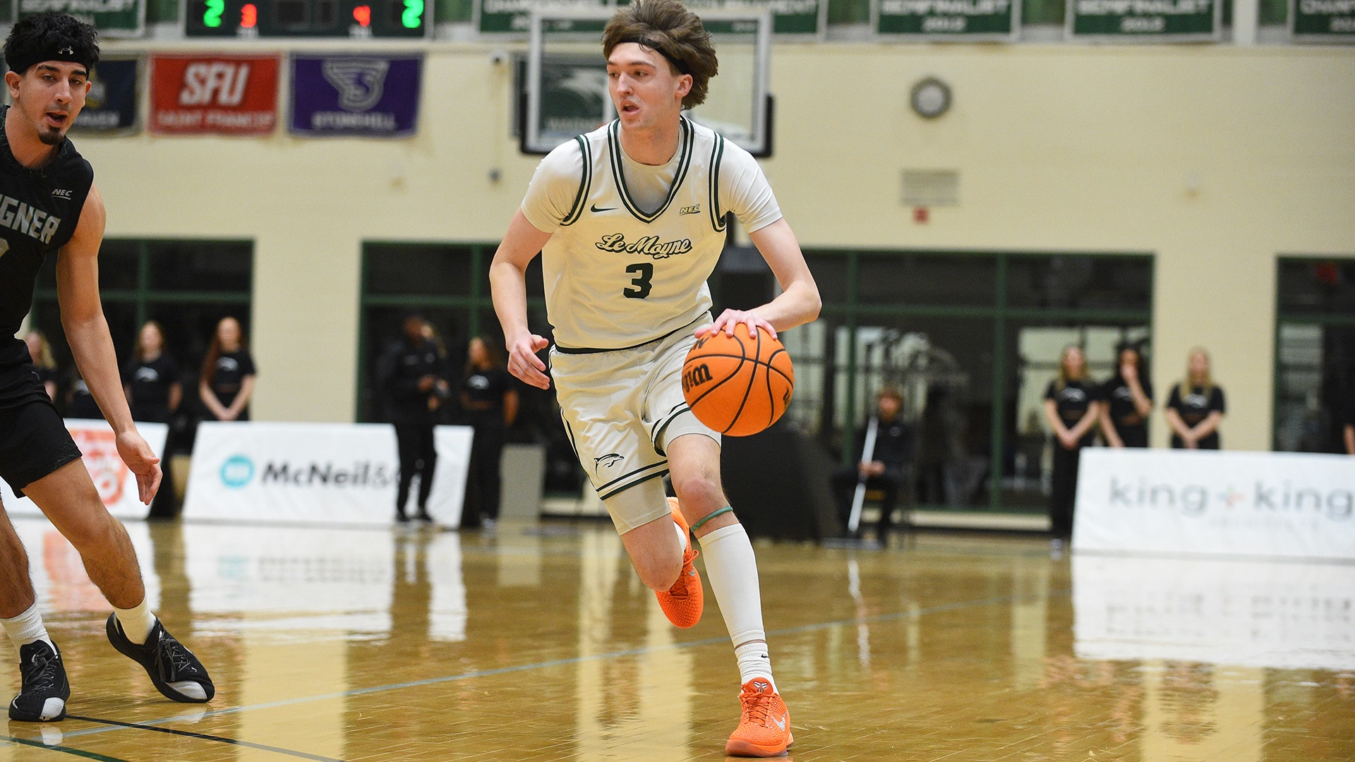 Eli Greenberg dribbling against Wagner College