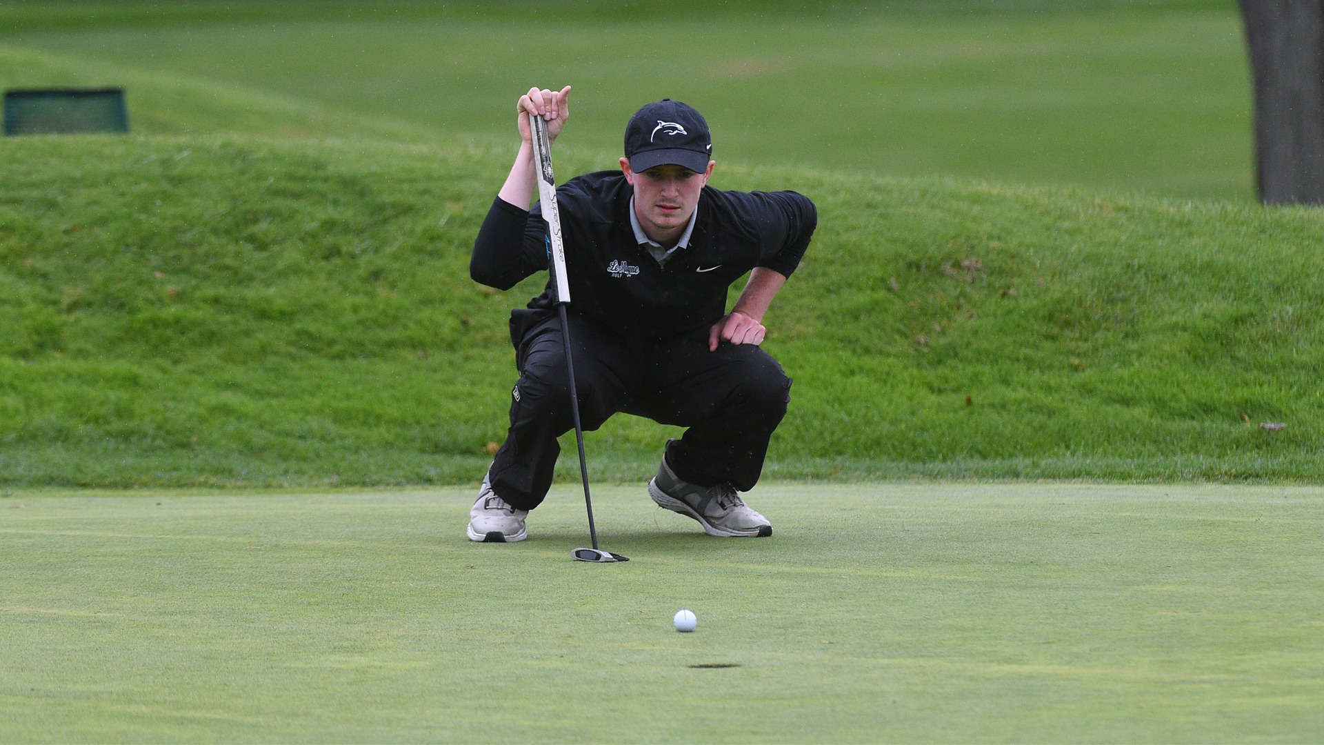 Owen Corby reads a putt during the CNY Challenge Cup