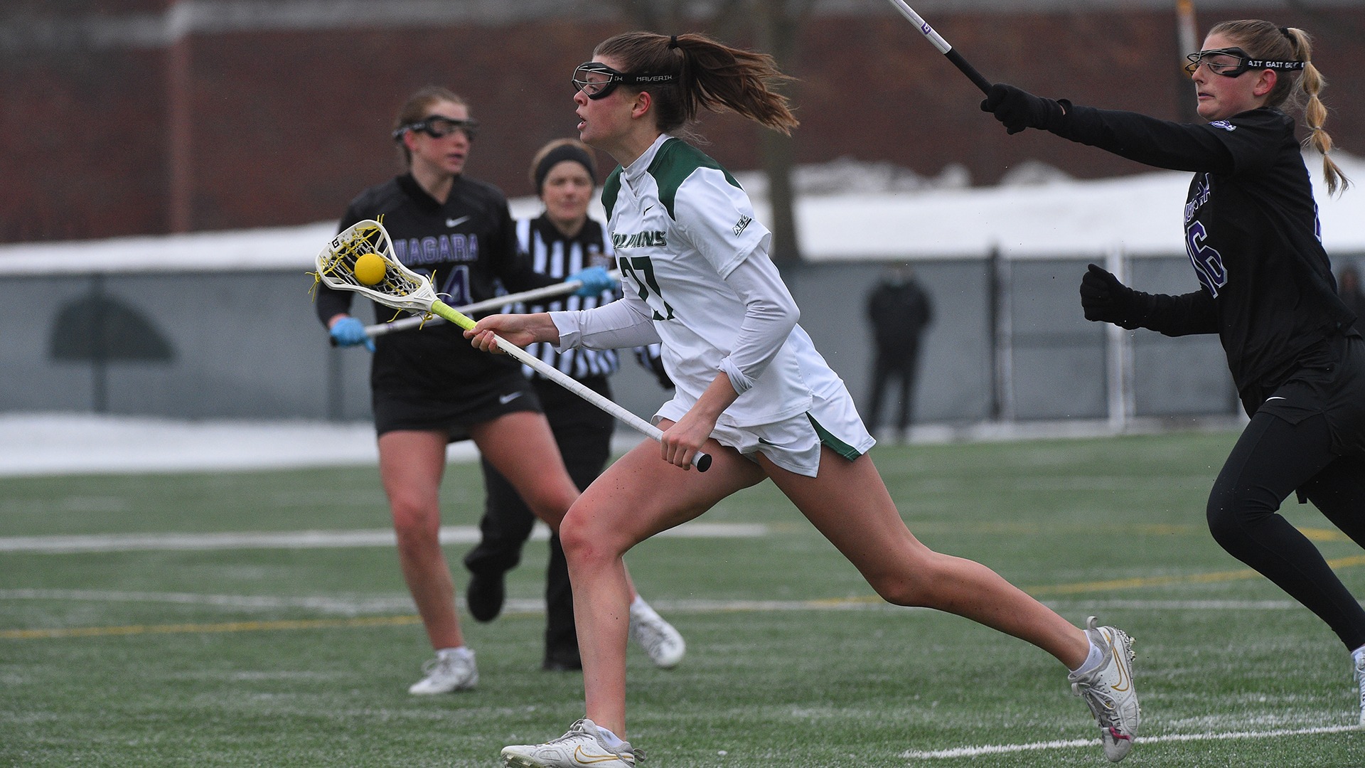 Blakeslee carries the ball against Niagara