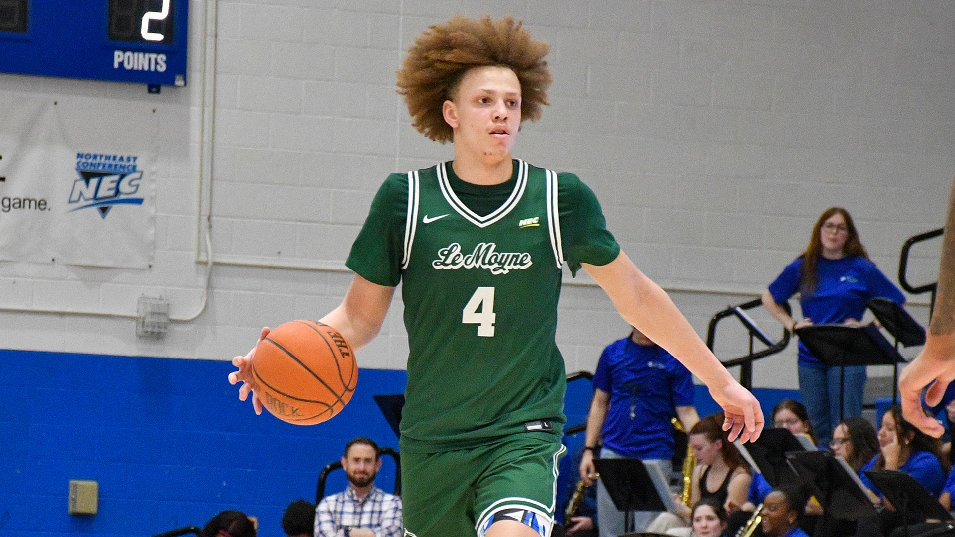 Shilo Jackson dribbles the ball up court against Central Connecticut State University