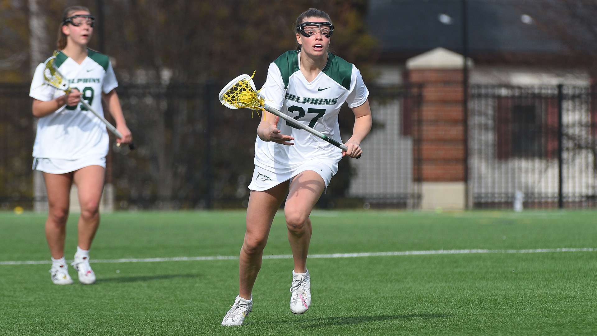 Julia Blakeslee clears the ball against Siena
