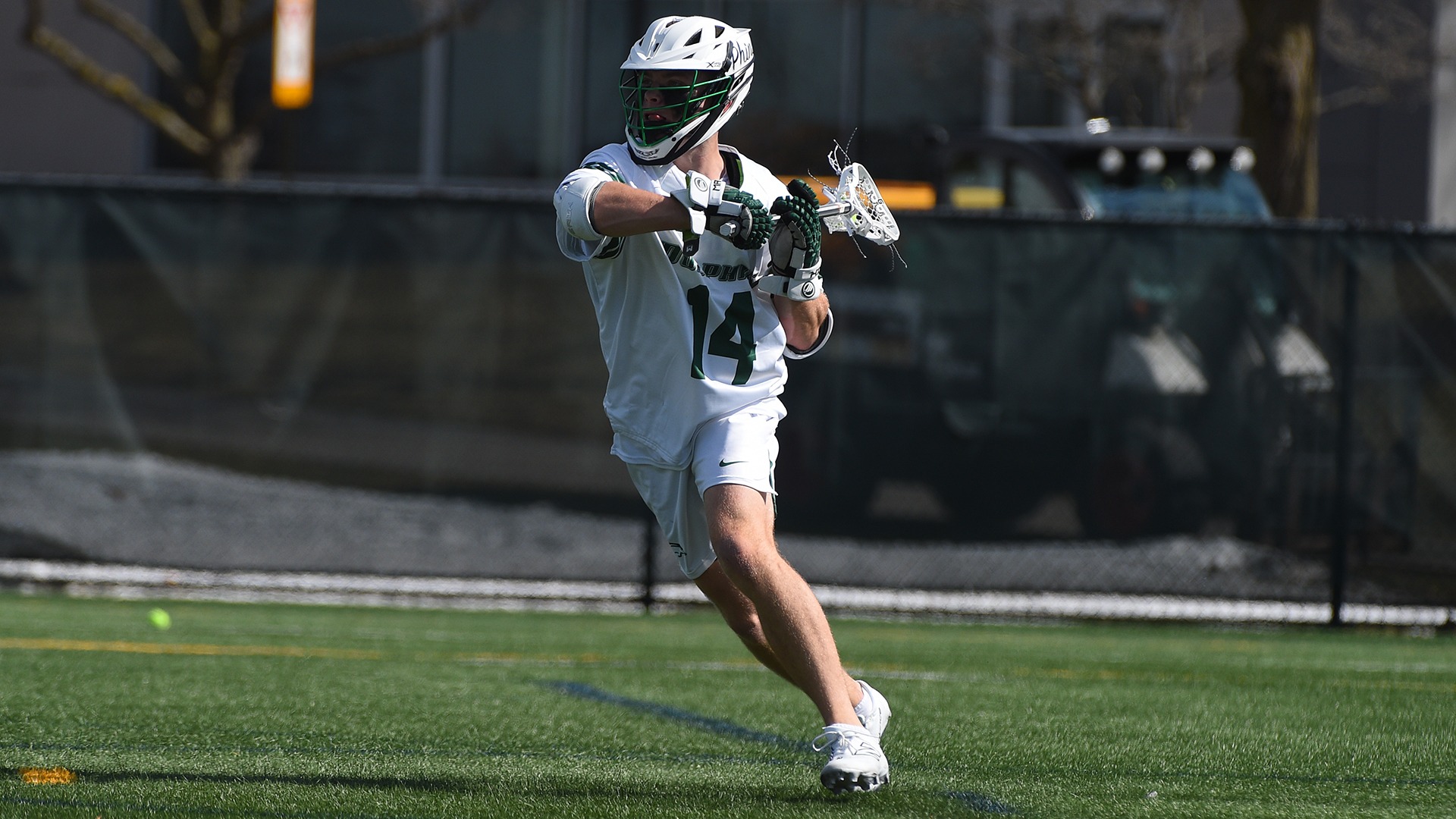 Thomas Berry looks to pass the ball from behind the goal against Manhattan