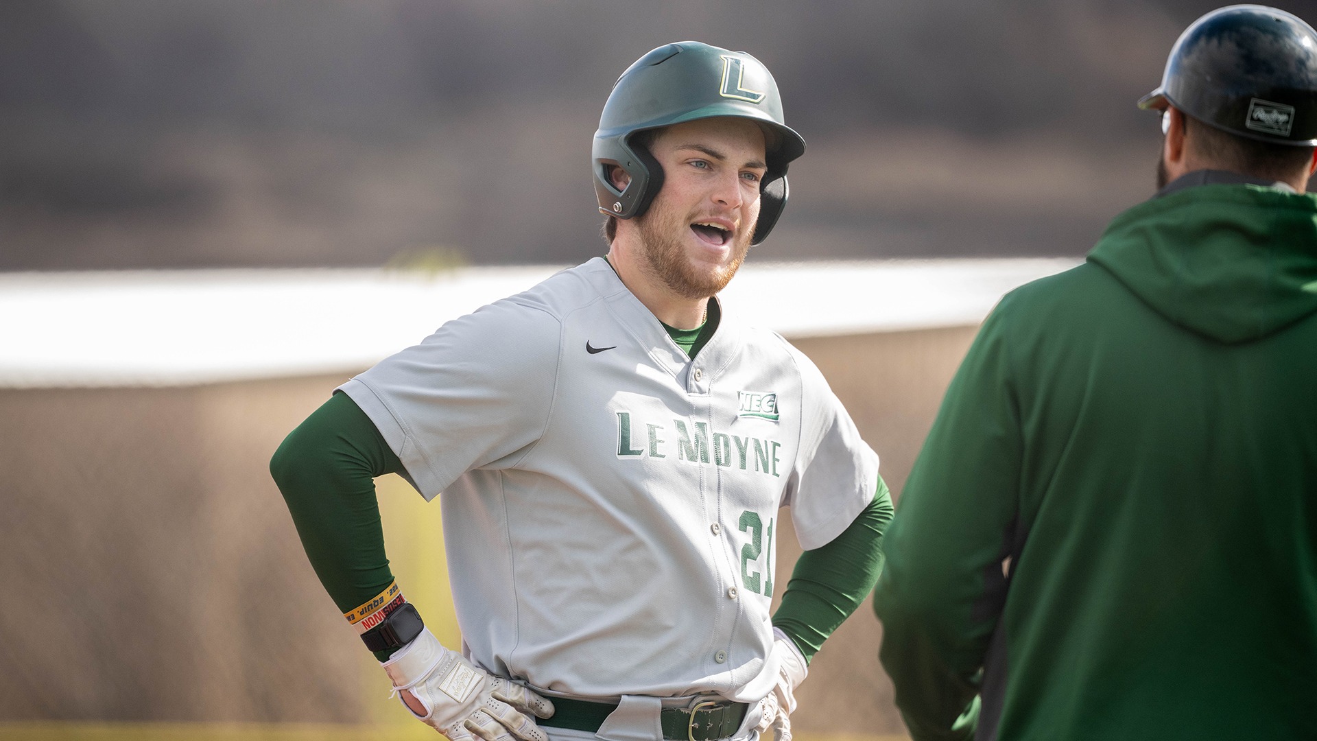 Jack Cannon talks with Coach Cassidy against Delaware State