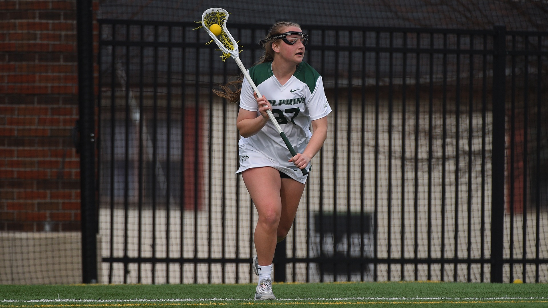 Mackenzie Prentice looking to pass the ball against Siena