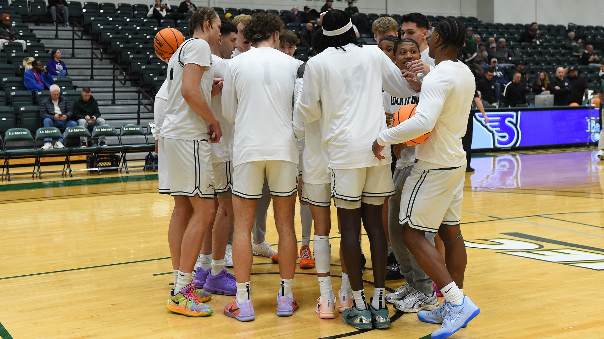 Men's Basketball pregame huddle against Stonehill in NEC Quarterfinal