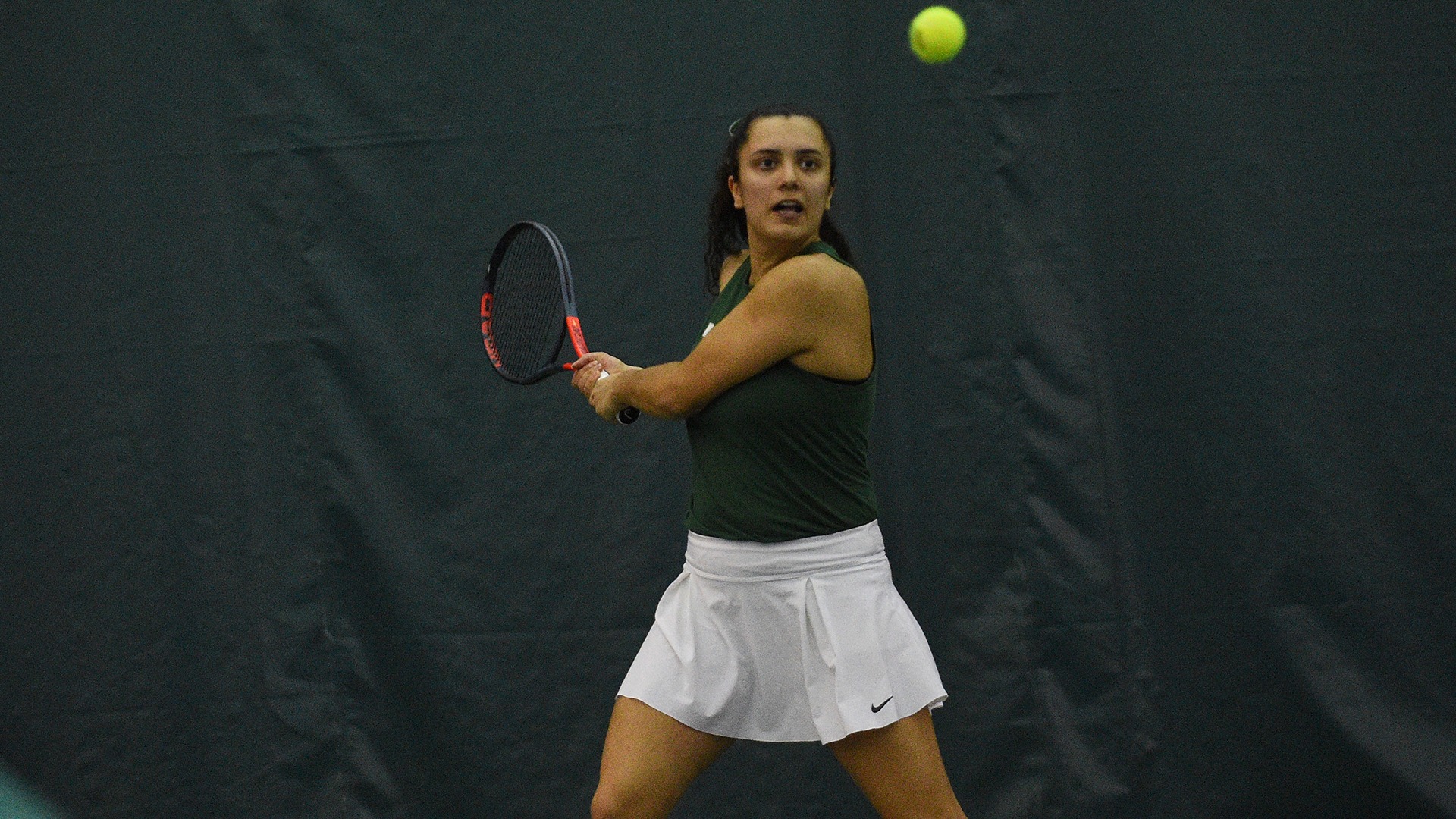 Ella Fernando prepares to hit the ball against Colgate