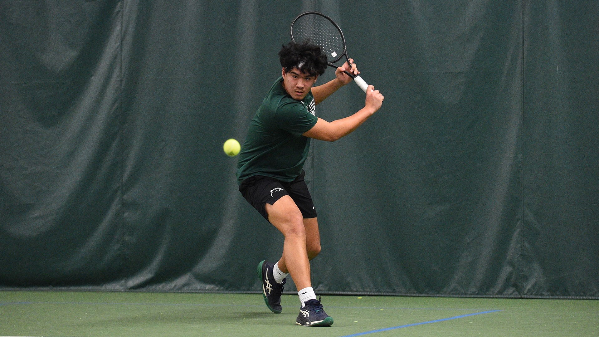 Gabriel Segubiense sets up to hit a backhand against Stonehill