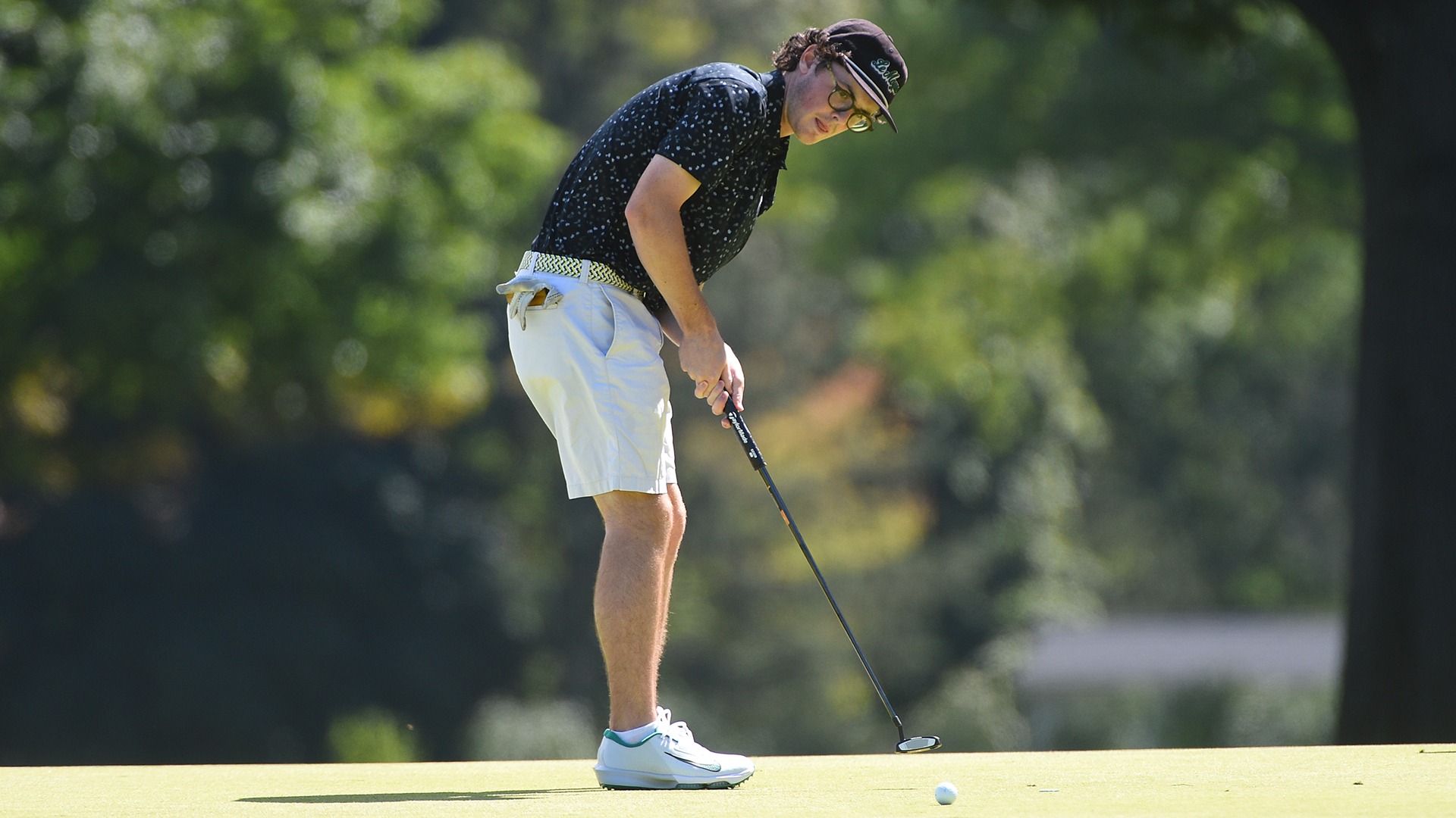 Mac Quinn putts the ball in a dual match against Niagara