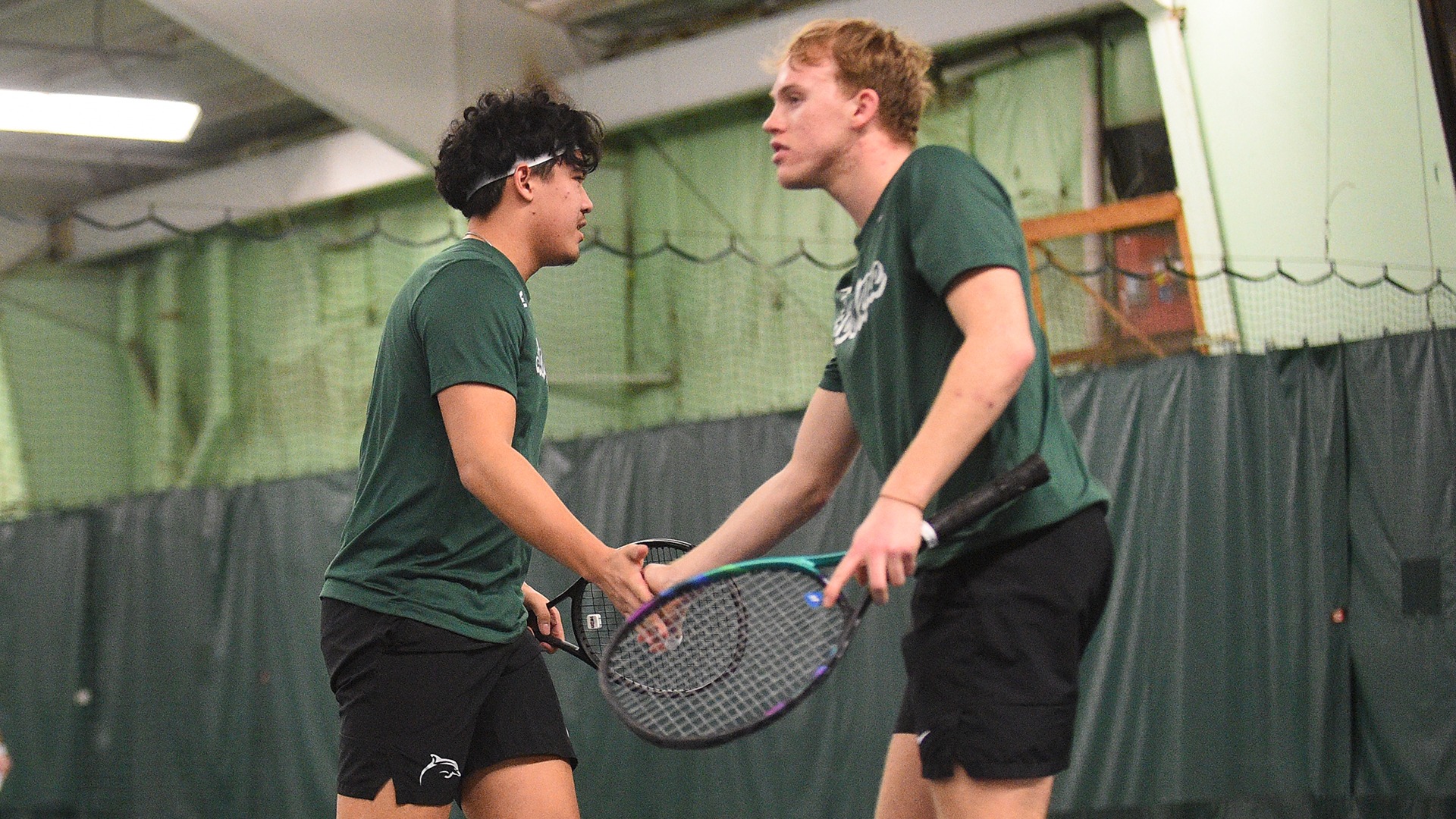 Luke Hoyland and Gabriel Segubiense slap hands after a point