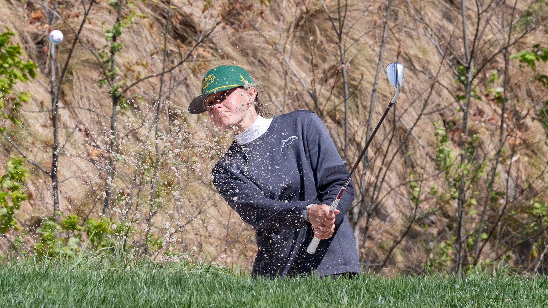 Caroline McShea hits out of a sandtrap at the NEC Championship